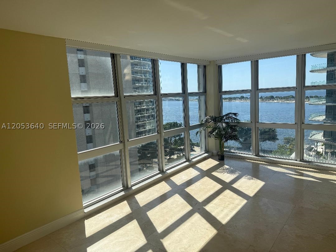 Huge spacious 3-bedroom 10th floor apartment with great city and ocean views and is accented with beautiful Italian travertine tile flooring. This renovated unit has new appliances and an abundance of large closets for storage. The sea breeze blowing from the ocean through the apartment enhances the ambiance of this gem. Large separate dining and living rooms, additional separate Florida room and full kitchen. You will be delighted with the easy access to I-95 north, Coconut Grove, South Beach and downtown Miami.