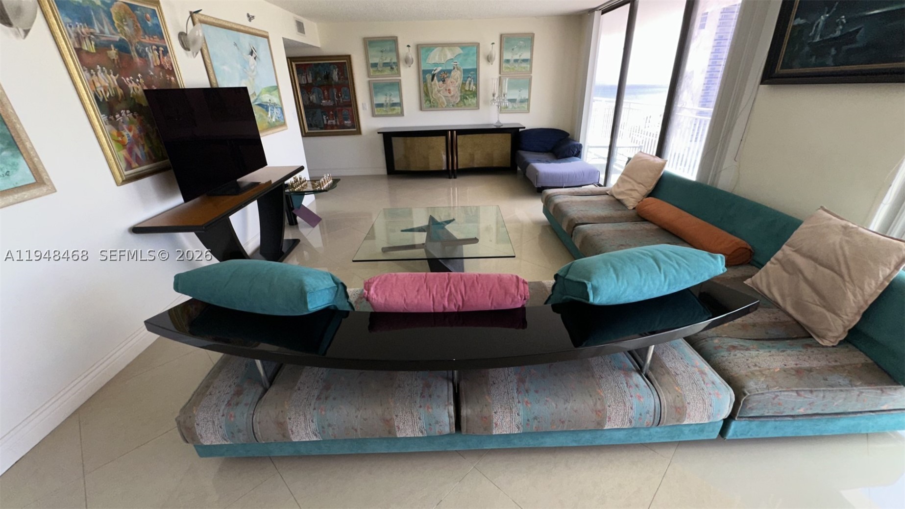 BREATHTAKING PANORAMIC OCEAN & CITY VIEWS.  CORNER UNIT WALK ACROSS THE STREET TO THE BEACH.  VERY SPACIOUS SPLIT FLOOR PLAN 3/3, 2 MASTER SUITES, 4 HEADED SHOWERS, JACUZI, STEAM SHOWER, WRAP AROUNG BALCONY.  WASHER/DRYER IN THE UNIT.  PORCELAIN AND MARBLE TILES, GRANIT & MARBLE COUNTER TOPS IN THE KITCHEN & BATHROOMS.  LARGE WALKIN CLOSETS, STORAGE ROOM RIGHT ADJACENT TO THE APARTMENT ENTRANCE IN HALLWAY.  AMENITIES:GYM, TENIS, GUARDED GATE, 24 HRS SECURITY IN THE LOBBY, GATED.  CLOSE TO MALLS, RESTAURANTS, PARKS, AND A+ SCHOOLS.