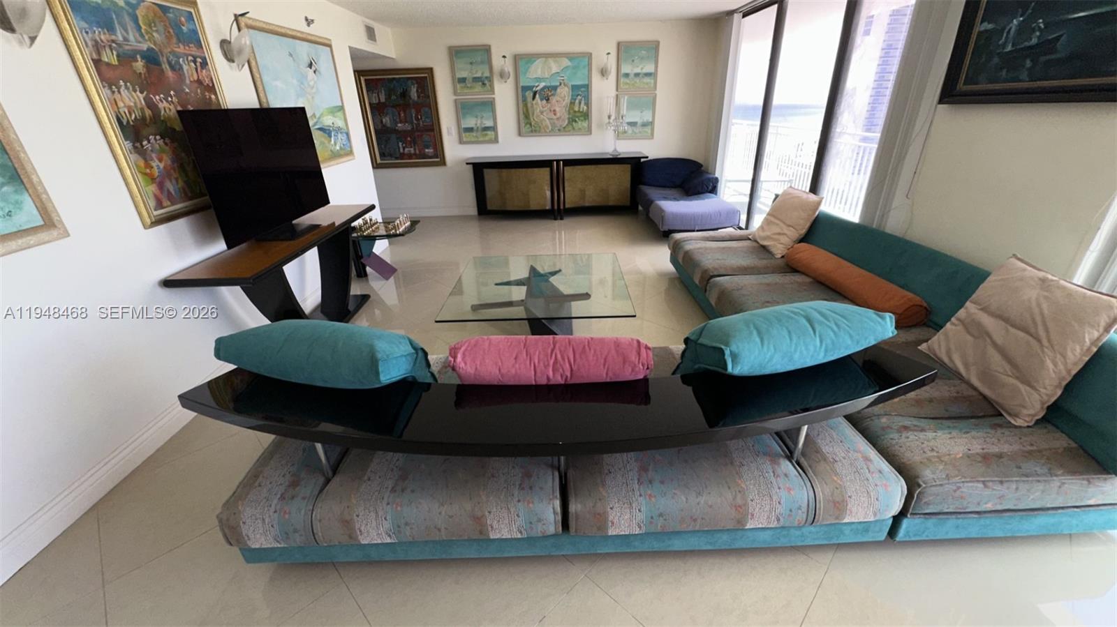 BREATHTAKING PANORAMIC OCEAN & CITY VIEWS.  CORNER UNIT WALK ACROSS THE STREET TO THE BEACH.  VERY SPACIOUS SPLIT FLOOR PLAN 3/3, 2 MASTER SUITES, 4 HEADED SHOWERS, JACUZI, STEAM SHOWER, WRAP AROUNG BALCONY.  WASHER/DRYER IN THE UNIT.  PORCELAIN AND MARBLE TILES, GRANIT & MARBLE COUNTER TOPS IN THE KITCHEN & BATHROOMS.  LARGE WALKIN CLOSETS, STORAGE ROOM RIGHT ADJACENT TO THE APARTMENT ENTRANCE IN HALLWAY.  AMENITIES:GYM, TENIS, GUARDED GATE, 24 HRS SECURITY IN THE LOBBY, GATED.  CLOSE TO MALLS, RESTAURANTS, PARKS, AND A+ SCHOOLS.