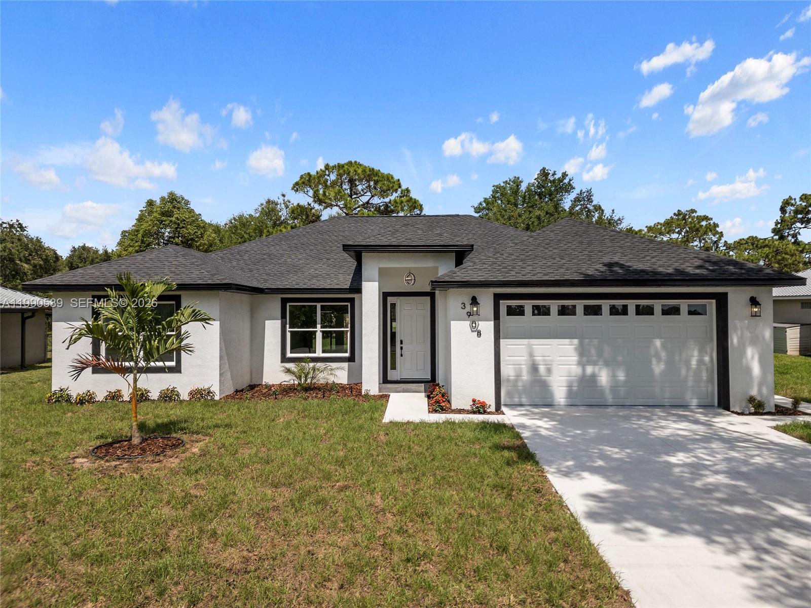Discover this stunning 3-bedroom, 3-bath home located in the highly sought-after Sun ‘N Lake Improvement District of Sebring, FL. Thoughtfully designed to blend elegance with everyday comfort, this property showcases high-end finishes and smart features throughout. Inside, enjoy soaring ceilings and an open-concept layout with luxury vinyl plank flooring across the entire home. The kitchen boasts granite countertops not only in the kitchen but also in all bathrooms and window sills, along with a stylish backsplash that adds personality. The primary bathroom feature premium tile and sleek glass shower doors, creating a spa-like experience. The 2-car garage offers an epoxy-coated floor for added durability, while the laundry room includes a convenient utility sink. The spacious primary suite provides comfort and privacy, and the additional bedrooms boast great natural light and ample closet space Step outside to a covered lanai with fans and lighting—perfect for entertaining or relaxing year-round. A full irrigation system and exceptional attention to detail inside and out make this home truly stand out. Key Features: • 3 Bedrooms | 3 Bathrooms • Granite countertops in kitchen, baths & window sills • Tile in all bathrooms + glass shower door • Luxury vinyl plank flooring throughout • Epoxy-coated garage floor + utility sink • Covered lanai with fans & lighting • Full irrigation system • 2-car garage Schedule your showing today and experience elevated living in Sebring!