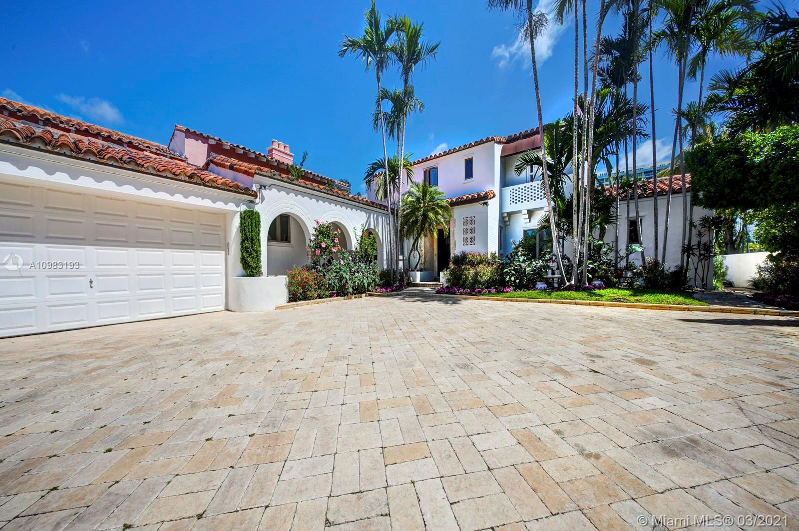 Prime location on the prestigious Pine Tree Dr. Enter "Villa Mare"  through a regal gate & expansive landscaped driveway. This romantic Mediterranean 1934 estate offers 5BD/5.5BA, 4,172 total sq ft, an ample 13,624 sq ft lot, approx. 78 ft of direct waterfront on scenic Indian Creek w/ no fixed bridges to bay, large dock & glass Florida room boasting over wide waterway. Artistically beautiful interior features high ceilings, well distributed layout & all en suite bedrooms. Downstairs you will find spacious living room w/ coffered ceilings, dining room, signature "Monkey Bar" perfectly appointed for entertaining. Stunning architectural details include tile mosaics, beautiful stone & woodwork, marble fireplace, archways & unique custom murals signed; J.McGibbon Brown, a famous  Miami artist.
