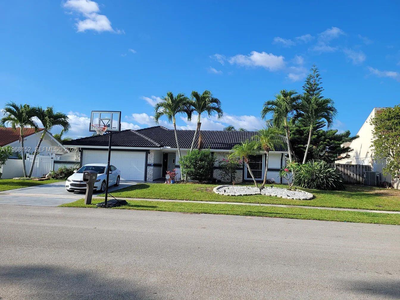 This is the one people wait years for. A rare opportunity to own a stunning single-family masterpiece in one of the most coveted neighborhoods in Boca Raton. Perfectly positioned on a serene lakefront lot, this nearly 2,000 sq. ft. three-bedroom, two-bathroom home delivers the kind of lifestyle most buyers only dream about.

Step inside and you’ll immediately feel the difference — every inch has been tastefully and thoughtfully renovated with a designer’s eye and a homeowner’s heart. The layout flows effortlessly, balancing open-concept living with just the right amount of warmth and privacy. Natural light pours in, highlighting clean lines, elevated finishes, and a move-in-ready elegance that feels both luxurious and inviting.

But the real magic? Step outside.

A massive screened-in pool area creates your own private resort oasis — perfect for hosting unforgettable gatherings or enjoying peaceful mornings overlooking the tranquil lake. The backyard view is pure South Florida perfection: sparkling water, wide-open skies, and total serenity.

Homes like this — renovated, lakefront, pool, and in a premier Boca location — rarely hit the market, and when they do, they don’t last. Whether you’re upgrading, relocating, or planting roots, this is more than a home… it’s a lifestyle statement.

Schedule your private showing before someone else claims your slice of paradise.
