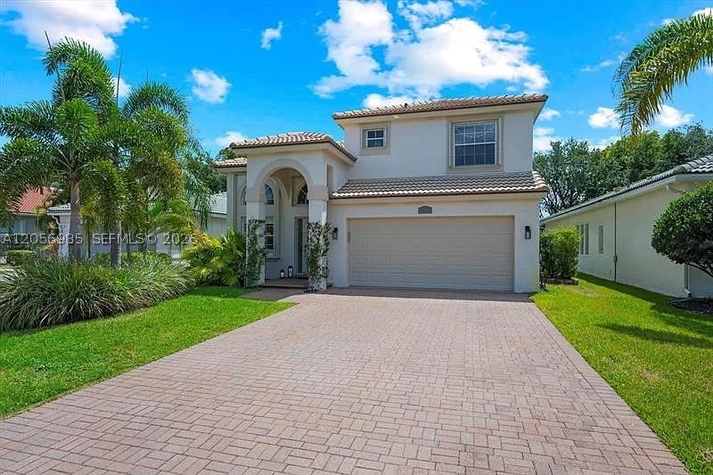 Welcome to this beautifully refreshed 4-bedroom, 2.5-bath home, ready for its new owners! This move-in ready home features brand-new vinyl flooring throughout all bedrooms, a freshly painted interior, and a modern kitchen equipped with brand-new, never-used appliances. Start your mornings with a peaceful view of the garden and sun coming from the family window creating the perfect setting to enjoy your coffee and the natural surroundings. Located in one of Wellington's most desirable communities, this home offers a welcoming neighborhood, excellent quality of life, and is just minutes from some of the area's top-rated schools. Don't miss this wonderful opportunity!