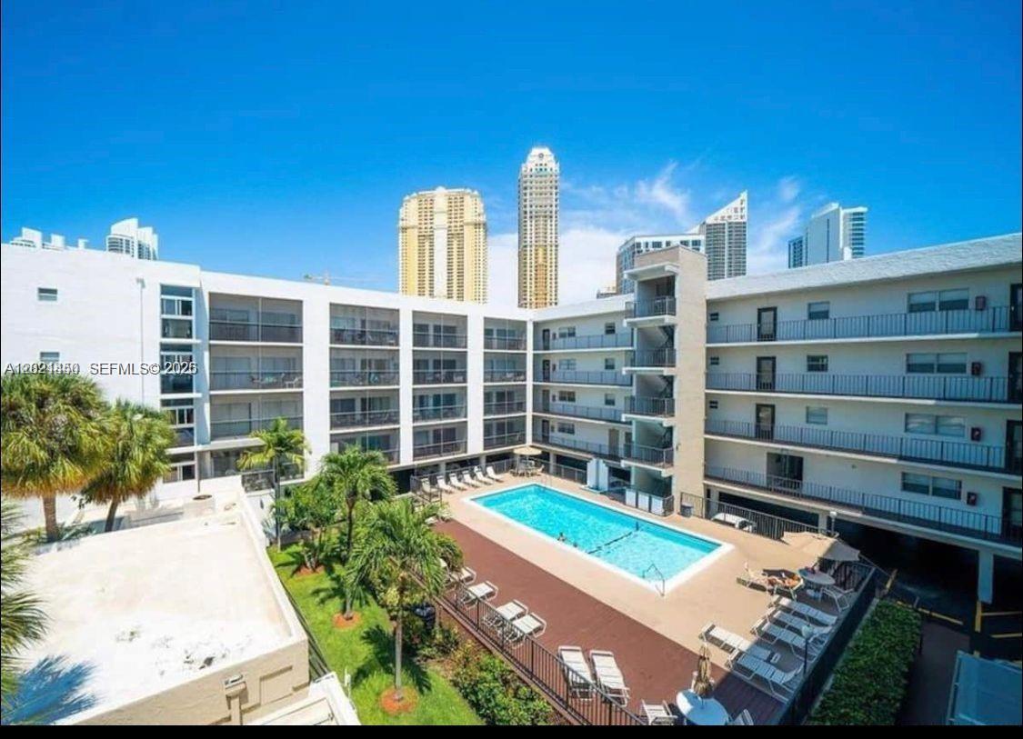 Amazing Investment condo or to live in. Nice condo 2 bedrooms 2 bathrooms in the heart of Sunny Isles Beach. Amazing location!! walking distance to the beach, shops, restaurants, shopping plazas and much more.. Association Includes Internet, water, basic cable and trash.
The condo has a community pool and laundry in each floor. One parking spot You can rent it short term airbnb friendly or long term without rental restrictions. HOA just $584 monthly