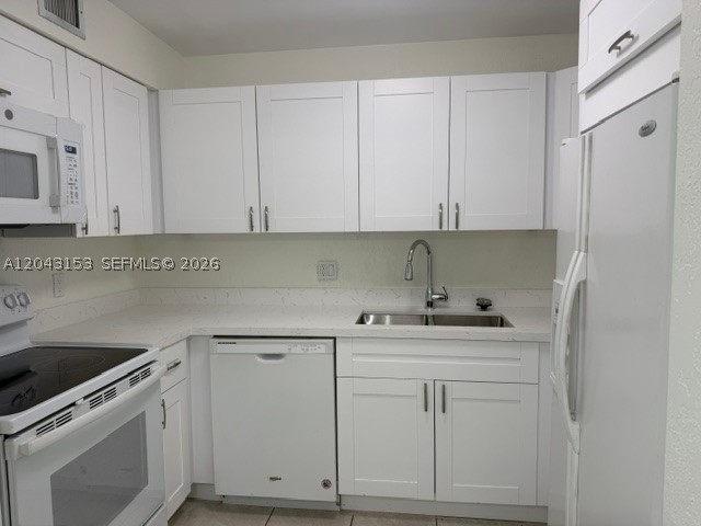 Beautiful updated 3/2 unit on the 1st floor with washer/Dryer inside and a large patio. Brand new Kitchen with quartz top, Complete New bathrooms and many more updates.  Buy to live or rent out immediately. Nice community with large community pool. Vacant, Easy to show, contact LA.
