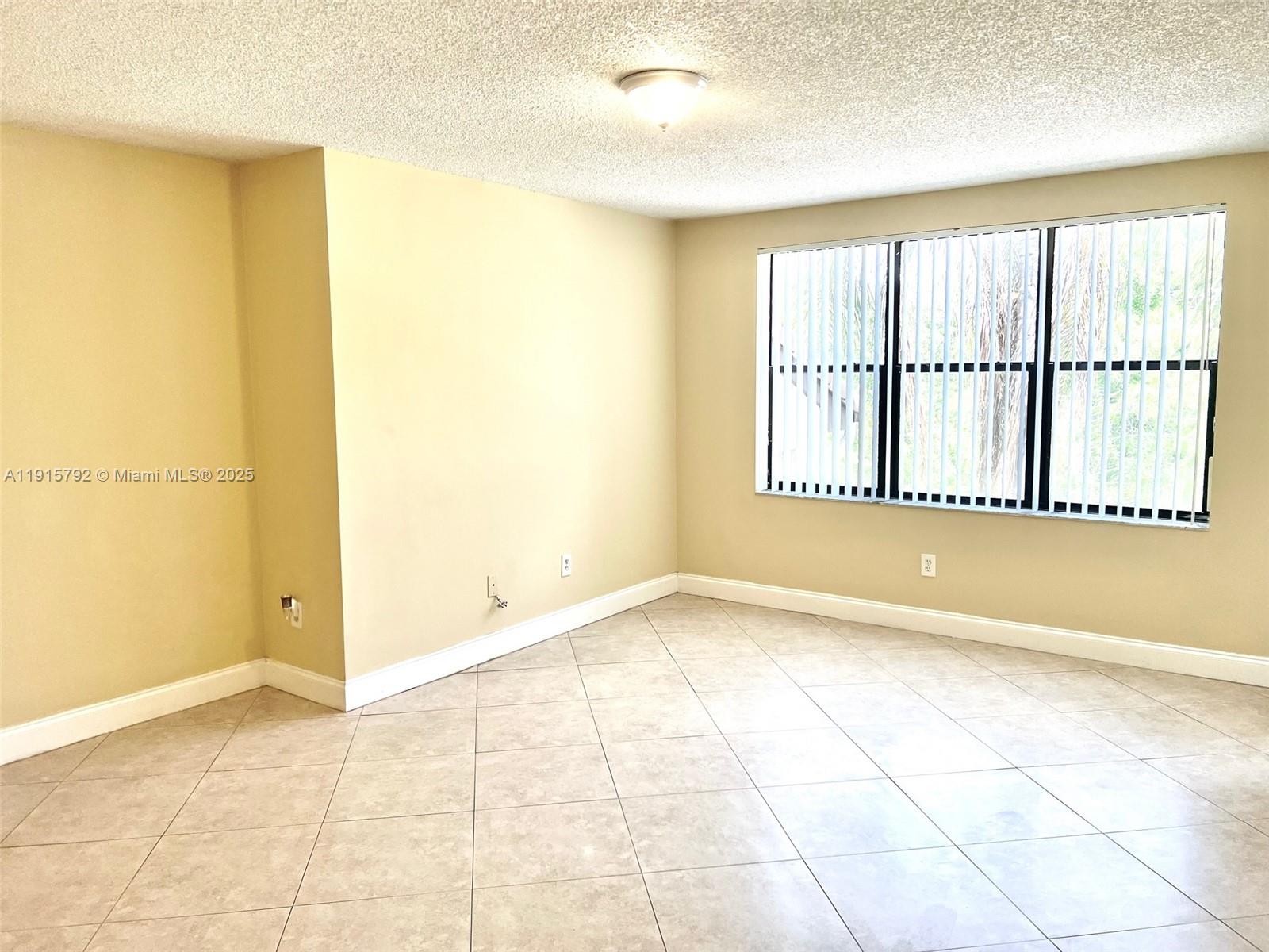 Priced to sell fast!! Beautiful and spacious 2bed/1bath apartment in the quiet, gated community of Palm Aire Gardens. Bathroom just remodeled! Tiled floors, remodeled kitchen, washer and dryer in the unit. Spacious walk-in closet. Community offers pool, tennis courts, gym. Rented until Feb' 2027.