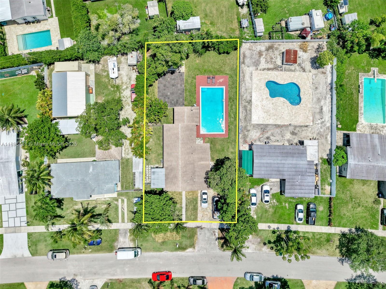 Welcome to this beautifully maintained 4-bedroom, 2-bath pool home situated on a spacious double lot in highly desirable Cutler Bay. This expansive double lot, more than 12,000 sf, offers exceptional space and versatility, providing ample room for outdoor living, future expansion, or secure boat parking—all within a lush, fenced yard adorned with mature mango and avocado trees. This house features a bright, open floor plan, the home offers a well-appointed kitchen with granite countertops, a large master suite with ensuite bath, and a separate laundry room with ample storage. Step outside to your private oasis with a 40x20 pool. Ideally located just minutes from parks, top-rated schools, shopping, US1, and the Turnpike. Schedule your showing today! Seller motivated and Seller can contribute with closing costs. Please send your best offer!!