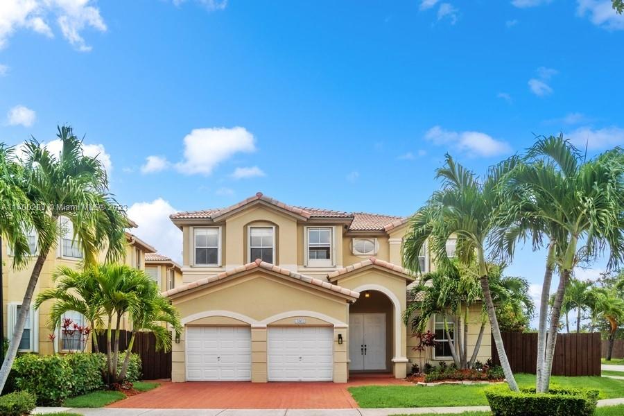 Cozy and Spacious lake front home at Islands at Doral with 4 Bedrooms, 4 Baths and lots of storage space. One bedroom and full bath at the lower level of the house; perfect option as a home office. Oversized corner lot with a large patio and a open porch to enjoy the lake view. Good location with easy access to Expressway, Malls and Schools. Great Community with Clubhouse and much to enjoy. Ceramic floors, high Ceiling, wood stairs, granite counter top kitchen, Laundry room and 2 car garage.
