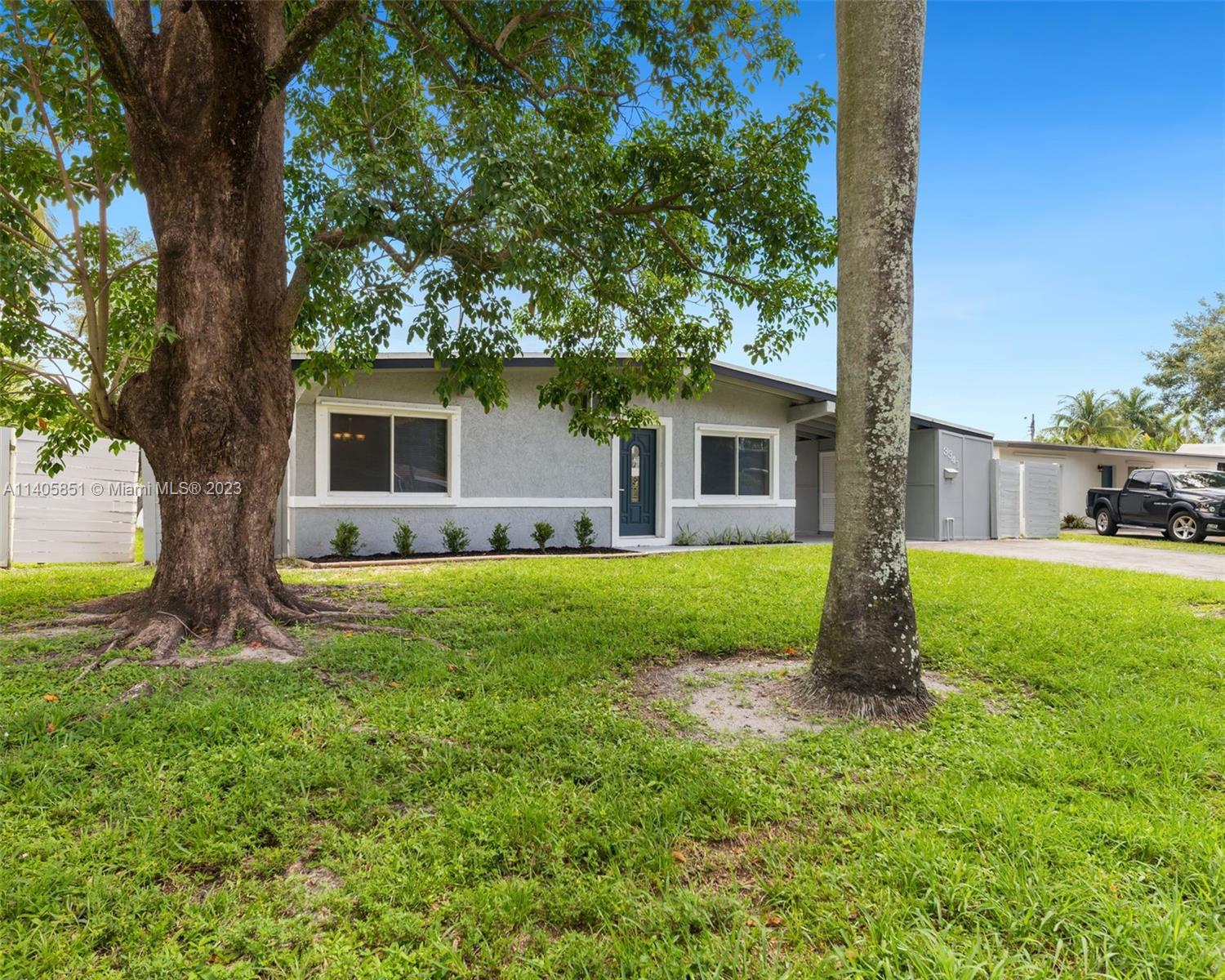 Charming updated 3 bedroom, 2 bathroom single family home. Features comfortable layout, central A/C, porcelain tile throughout home, spacious floor plan with good-sized bedrooms, laminate wood in two bedrooms, updated kitchen with stainless steel appliances, newly remolded bathrooms with modern fixtures, full size washer, dryer, carport, walk to schools, 3 parks, boat launch nearby, boat/RV parking possible, large fenced in backyard (basic yard service included). Minutes to 595, 95, & Turnpike, Downtown/Las Olas, and beaches! Hard Rock Resort Casino, Universities, and Outlet Sawgrass Mills Mall. Pet friendly. 1 year minimum lease