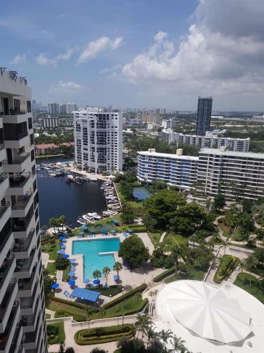 MAKE YOUR OFFER ON THIS ONE OF A KIND BEAUTIFULLY STYLED CONDO WITH MAGNIFICENT CITY AND WATER VIEWS. LOCATED ON THE TOP FLOOR OFFERING HIGH CIELINGS IN ALL LIVING AREAS. GUEST BEDROOM OFFERS A MURPHY BED IDEAL FOR OFFICE SPACE. AMAZING LOCATION: OLYMPUS OFFERS BBQ AREA ,TWO RESORT STYLE POOLS SITTING ON 18 ACRES OF LAND WITH BEAUTIFUL LADSCAPING, COVERED PARKING AND EXTRA STORAGE INCLUDED, FIVE TENNIS COURTS, STATE OF THE ART FITNES CENTER, CAFE, YOGA ROOM, SAUNA AND LOCKER ROOMS. IDEAL LOCATION MINUTES TO SHOPPING, BEACHES, AVENTURA MALL, AIRPORTS AND MANY RESTORANTS. SCHEDULE YOUR SHOWING TODAY!!!