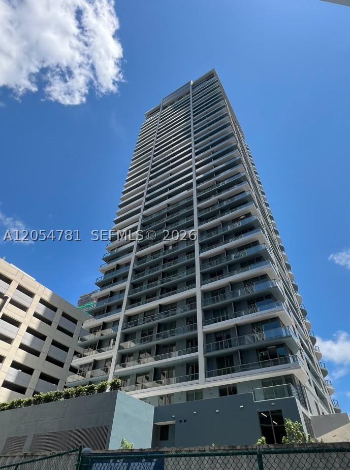 Experience luxury living at 501 First in the heart of Downtown Miami. This brand-new, fully furnished residence features designer finishes, floor-to-ceiling windows, a private balcony, Italian cabinetry, premium European appliances, built-out closets, and an in-unit washer and dryer. Residents enjoy over 20,000 square feet of resort-style amenities, including a rooftop pool, hot and cold plunge pools, fitness center, yoga studio, co-working spaces, private dining rooms, outdoor movie theater, sunrise and sunset terraces, and stunning 360-degree city and bay views. Ideally located just steps from Miami Worldcenter, Kaseya Center, Museum Park, Brightline, Pérez Art Museum, and Biscayne Bay. With no rental restrictions, this property offers an outstanding opportunity for both homeowners and investors.