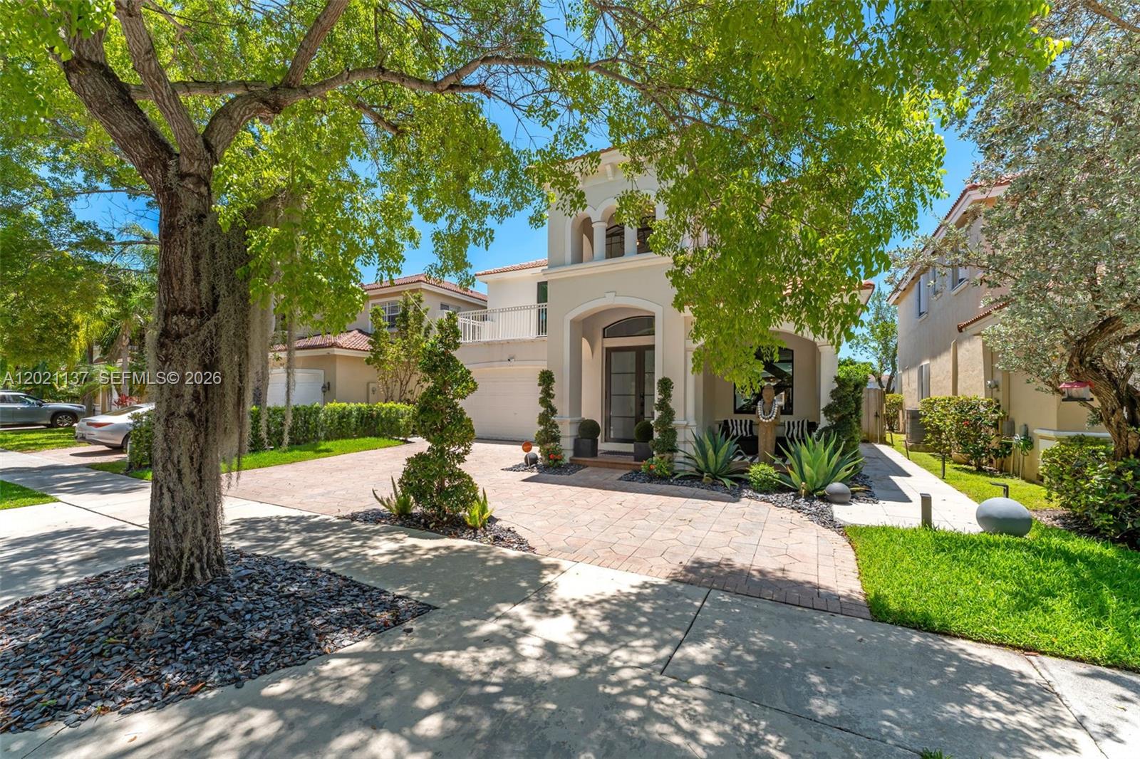 Turn-key fully remodeled home in the heart of Cutler Bay featuring a modern open-concept layout and designer finishes throughout. Italian tile flows seamlessly across the floors and bathroom walls, creating a sleek and luxurious feel. The custom chef’s kitchen is equipped with panel-ready appliances, quartzite countertops, and a full matching quartzite backsplash. A stunning custom glass staircase adds a sophisticated architectural touch. Step outside to your private oasis with a brand-new saltwater pool featuring stream jets, a beach entry, and serene lake views. Located in a quiet, family-friendly neighborhood perfect for enjoying the best of South Florida living.