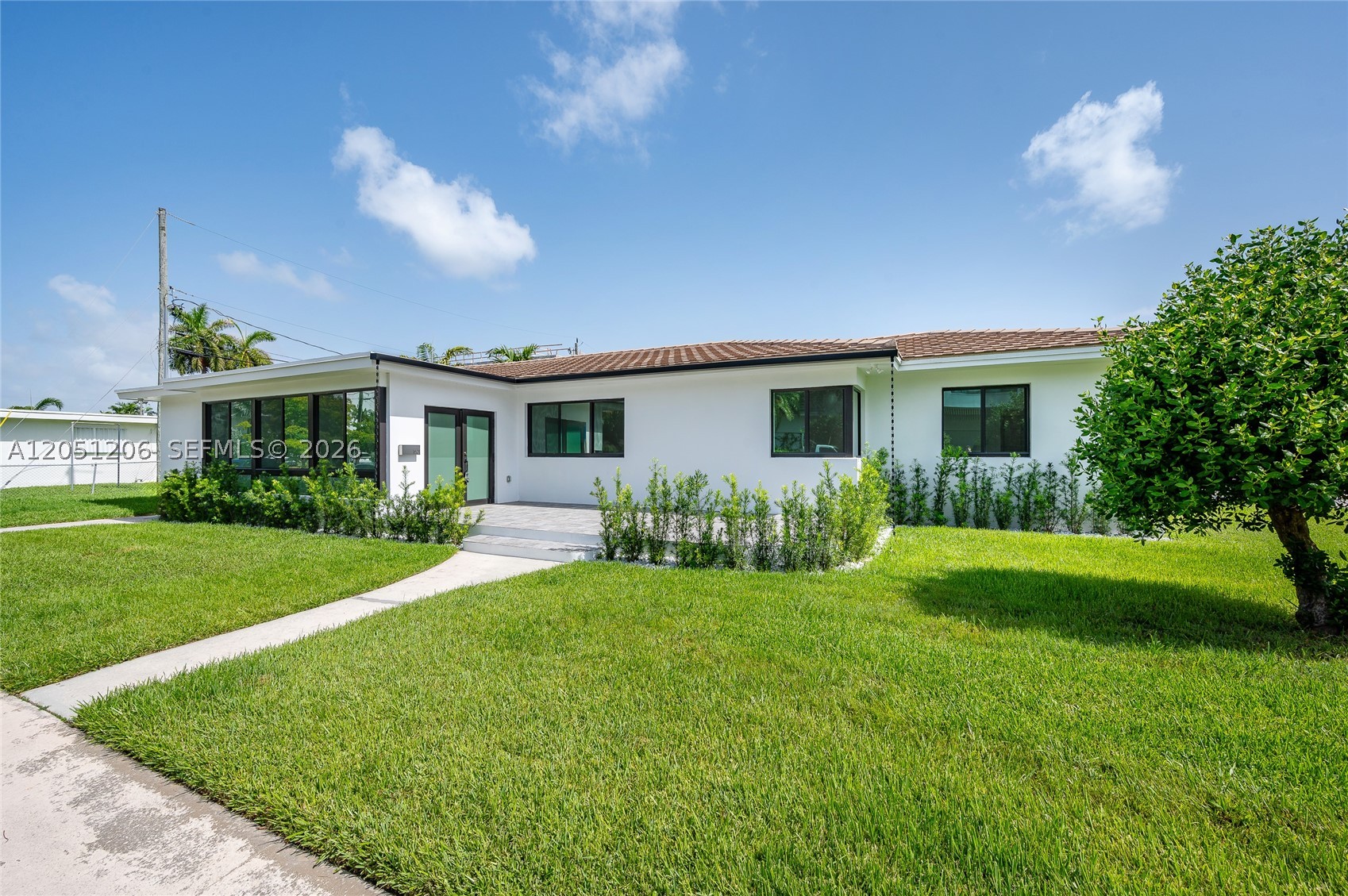 FOR RENT stunning & completely renovated house in North Bay Village, Miami, FL. 4 BR, 2.5 BA. Welcome to your dream home! This awesome house has been completely and meticulously renovated from top to bottom, offering an unparalleled modern living experience. Step inside to an expansive, sun-drenched open floor plan featuring brand-new, high-end porcelain flooring, recessed lighting, and sleek modern finishes throughout. The chef’s kitchen is a showstopper, fully equipped with custom cabinetry, pristine countertops, and premium appliances—perfect for effortless entertainment. The main suite serves as a private sanctuary with a generous walk-in closet and a spa-like en-suite bathroom. 3 additional spacious bedrooms offer ultimate flexibility, a dedicated home office, or a personal fitness studio. North Bay Village is Miami's best-kept secret, a serene, safe island paradise nestled directly in Biscayne Bay, offering a quiet escape from the frantic energy of the city while keeping you minutes from the action. Renting a fully renovated 4-bedroom house in this highly competitive island market is a rare find. Terms: 1st Month, Security Deposit. Do not miss it. Will not last.