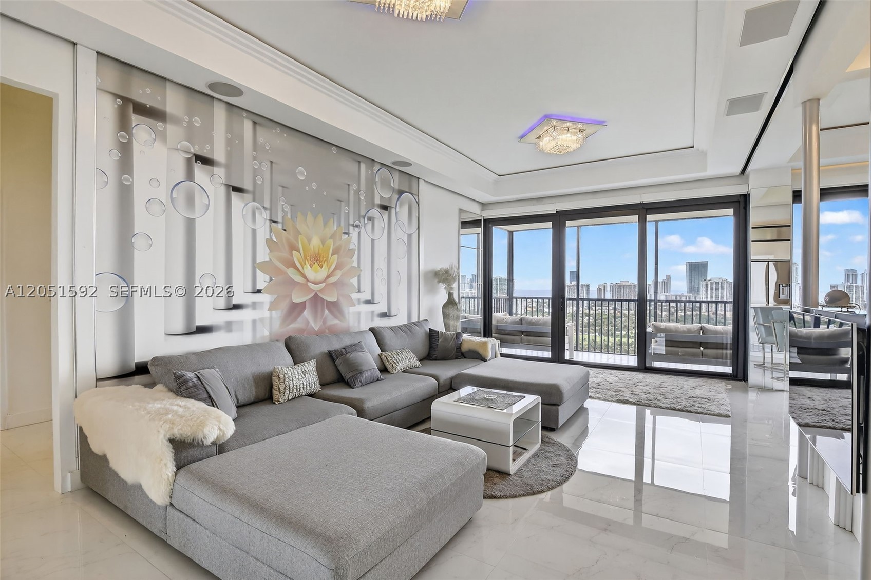 Unparalleled corner penthouse in the luxury Coronado I with breathtaking ocean, golf course, and city views. The spacious balcony extends the living area outdoors, offering a perfect place to relax and take in the views. This fully furnished residence has been masterfully redesigned with porcelain floors, hurricane-impact windows and doors, elegant tray ceilings with custom lighting, and designer mirrors. The open living and dining areas flow beautifully into a modern kitchen with a spacious pantry. Building features a brand-new lobby, elevators, and hallways and has passed the 40-year certification. Enjoy resort amenities including a heated pool, jacuzzi, sauna, fitness center, and 24-hour security near Aventura Mall, beaches, and fine dining.