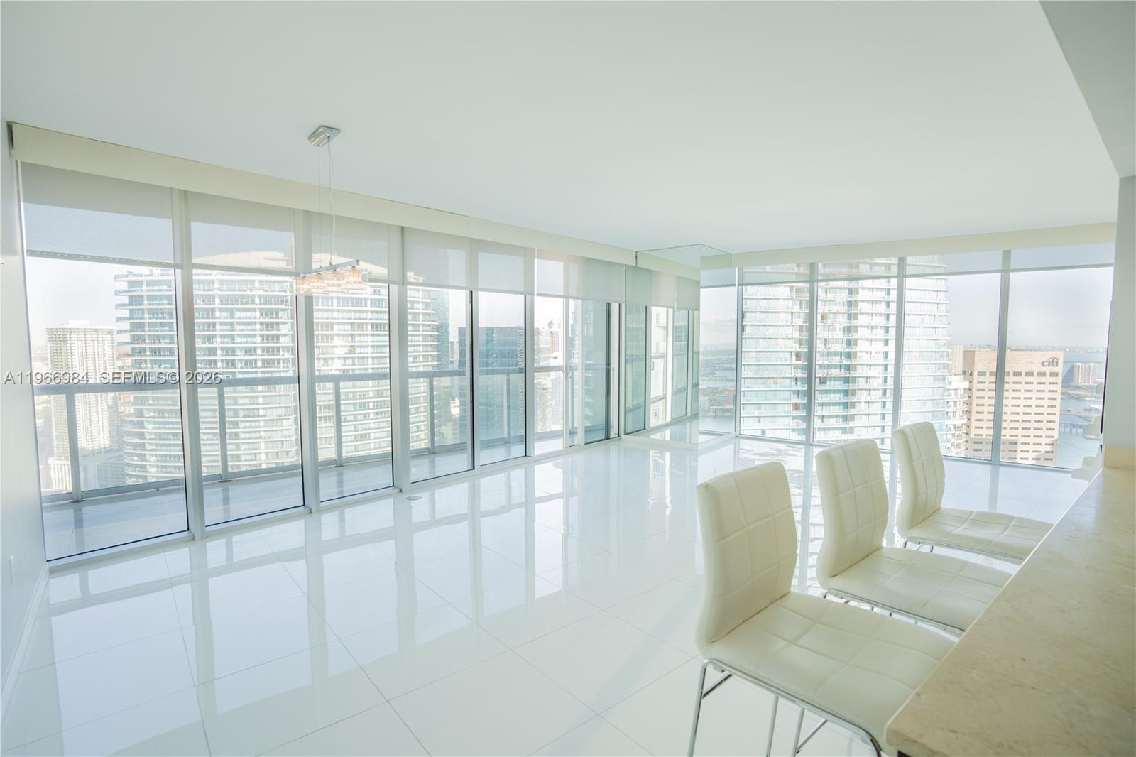 This large corner unit in Icon Brickell Tower 1 Icon is the essence of luxurious waterfront living.With 2 bedrooms and 2 bathrooms, the spacious design and white porcelain floors create a sleek and modern atmosphere. The abundance of windows offering panoramic views of the Miami River, the city, and Biscayne Bay. The floor-to-ceiling windows amplifies the beauty of the surroundings. Icon Brickell really offers top-tier amenities—state-of-the-art gym, an amazing pool area, and high-end restaurants, making it a luxurious living experience. Plus, its central location puts you close to popular spots like Mary Brickell Village, Brickell City Center, Whole Foods, and more. It really seems like the perfect blend of luxury, convenience, and style.
