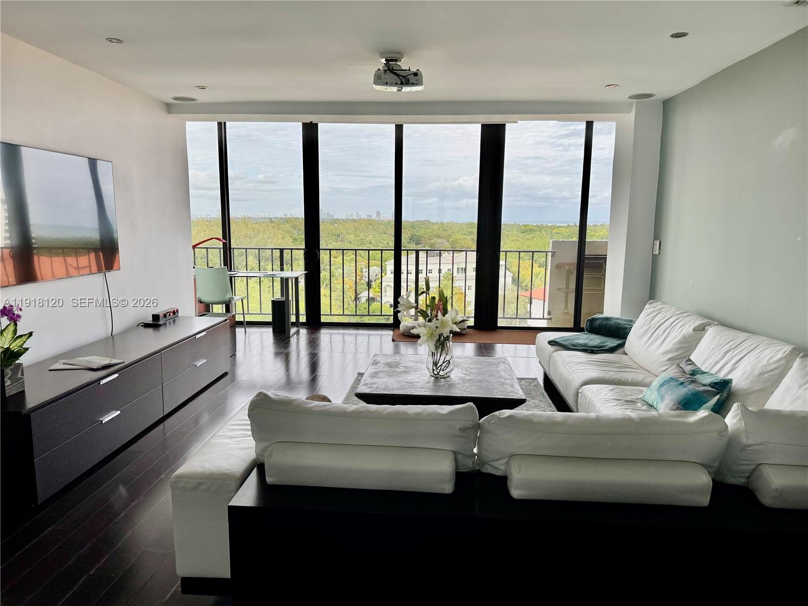 Enjoy stunning sunrises and sunsets from this bright corner unit on the 10th floor. This fully furnished, fully equipped home features a private split floor plan with two ensuite master bedrooms, a glass-enclosed balcony for added living space, wood floors, stainless steel appliances, and in-unit washer/dryer. Includes 1 covered parking space. The Palms of Key Biscayne offers a pool, meeting room, bike storage, private beach access, and secured entry. Water, sewer, and cable TV included. Prime location next to Crandon Park, across from the gas station, walking distance to schools, restaurants, and public transit. Available from December 10h, 2025.