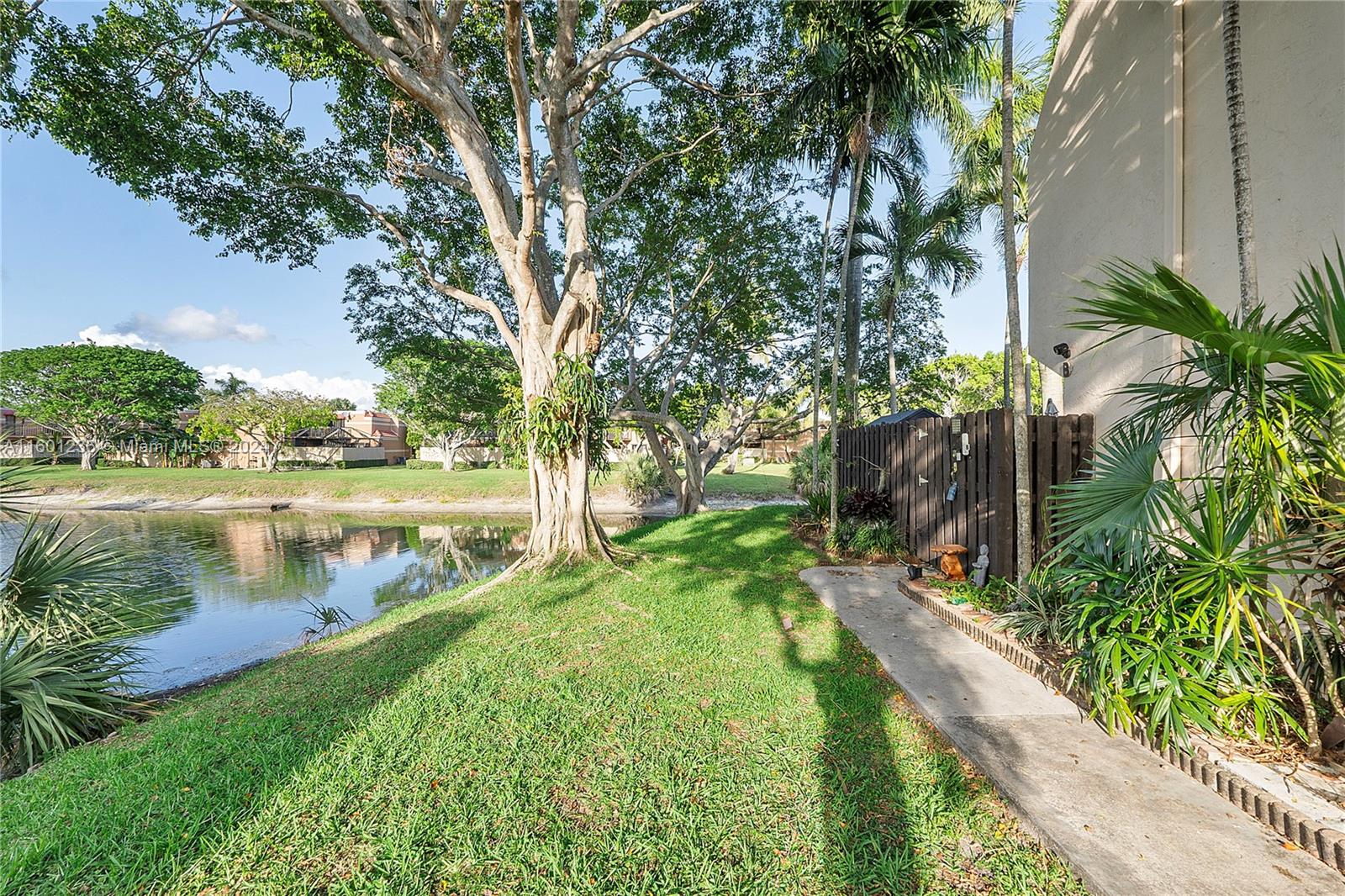 Welcome to your cozy oasis in Greenacres, Florida! This charming 2-bedroom, 2-bathroom townhome boasts a delightful open front porch, perfect for enjoying those warm Florida evenings. One of the property's standout features is its proximity to a variety of shops and restaurants. Running errands or finding the perfect dining spot has never been easier. The convenience of this location will simplify your everyday life. If you love the beach, this home is for you! Florida's beautiful beaches are just a short 15 minute drive away. Enjoy weekends filled with sunbathing, beach-combing, and relaxation. Your coastal getaway is right around the corner. The spacious, fully fenced-in patio offers an ideal setting for outdoor entertaining, gardening, or simply enjoying your morning coffee.