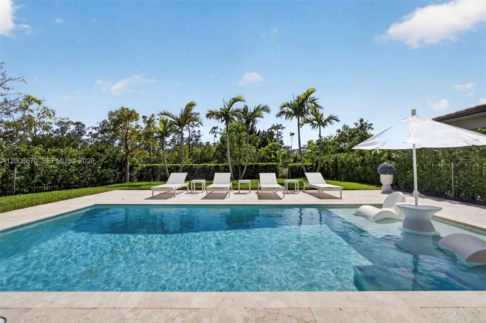 Stunning 4-year-young one-story residence in prestigious Ibis Golf & Country Club showcasing exceptional designer upgrades, privacy and a sought-after open floor plan. Features 3 spacious en-suite bedrooms, separate den and powder room. Positioned on an extra-deep 193-ft fenced preserve lot with no rear neighbors offering rare peace and tranquility. Though only 4 years old, many premium upgrades were completed within the past 12-24 months. Interior highlights include large-format Italian porcelain flooring throughout, designer light fixtures, plantation shutters and custom walk-in closets. Gourmet kitchen with premium JennAir appliances including wall oven/microwave combo, gas cooktop, built-in paneled refrigerator, waterfall counters, wine cooler, and insta-hot dispenser. Hurricane impact windows and doors throughout. Additional features include whole-house Generac Generator with EV charger capability, tankless water heater and underground natural gas service. Enjoy seamless indoor/outdoor living with an 18x22 covered lanai overlooking the 25-ft pool with sunshelf and oversized travertine patio. Rare move-in-ready opportunity in one of Palm Beach County’s premier golf communities. HOA/POA includes premium X-finity Cable/high-speed internet, monitored alarm, lawn care, 24 Hr. manned Guard gates with roving security, on-site EMT & 100,000 SQ. FT. OWNERS CLUB WITH 4 ON-SITE RESTAURANTS, THREE 18 HOLE NICKLAUS COURSES, PICKLEBALL, TENNIS, ETC. Sizes, measurements subj to verif.