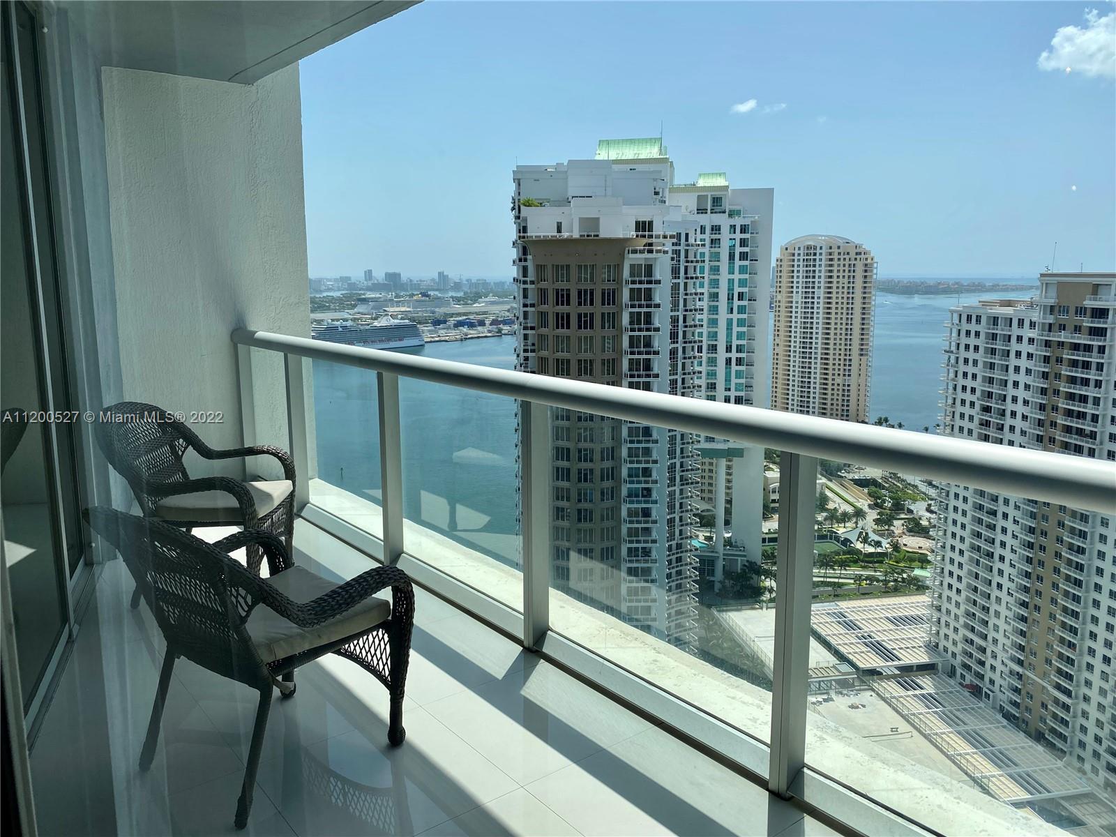 Beautiful 2/2 + Den with decorator furniture, Italian white porcelain tile, open kitchen, stainless steel appliances; floor to ceiling impact windows w/unobstructed water views. Control 4 system installed for home automation; master w/2 walk-in closets. Building has two 5 star restaurants, state of the art spa, Infinity pool, valet, security, gym, theater, and unparalleled amenities.