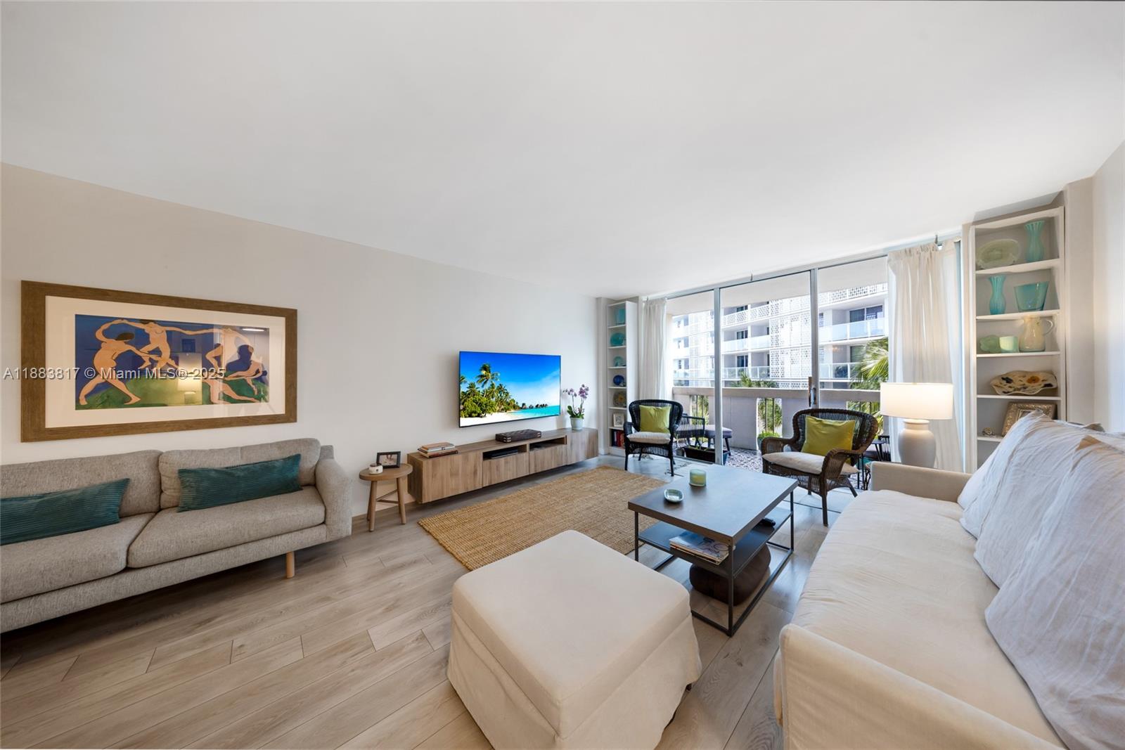 Spacious & elegantly fully renovated, 850 SF, One bedroom in spectacular South Bay Club. Resort style living with an open-air lobby, bay front pool/hot tub deck with bbq area, gym, & on site Cafe/Market. White shaker style custom cabinetry, brass handles, white quartz countertops & stainless steel appliances in kitchen, Cobalt blue cabinetry & tile in the bath, White Oak built-in desk in the living room, Driftwood custom designed walk-in closet with ample shelving, drawers & hanging storage, and Grey Oak, laminated wood plank flooring throughout. NEW 2024 AC.Views of Biscayne Bay & Miami Skyline from your large balcony w/ custom flooring. One covered assigned parking space in the building garage.Located on West Ave, just min to the Park, beach, cafés, restaurants, & Lincoln Road.