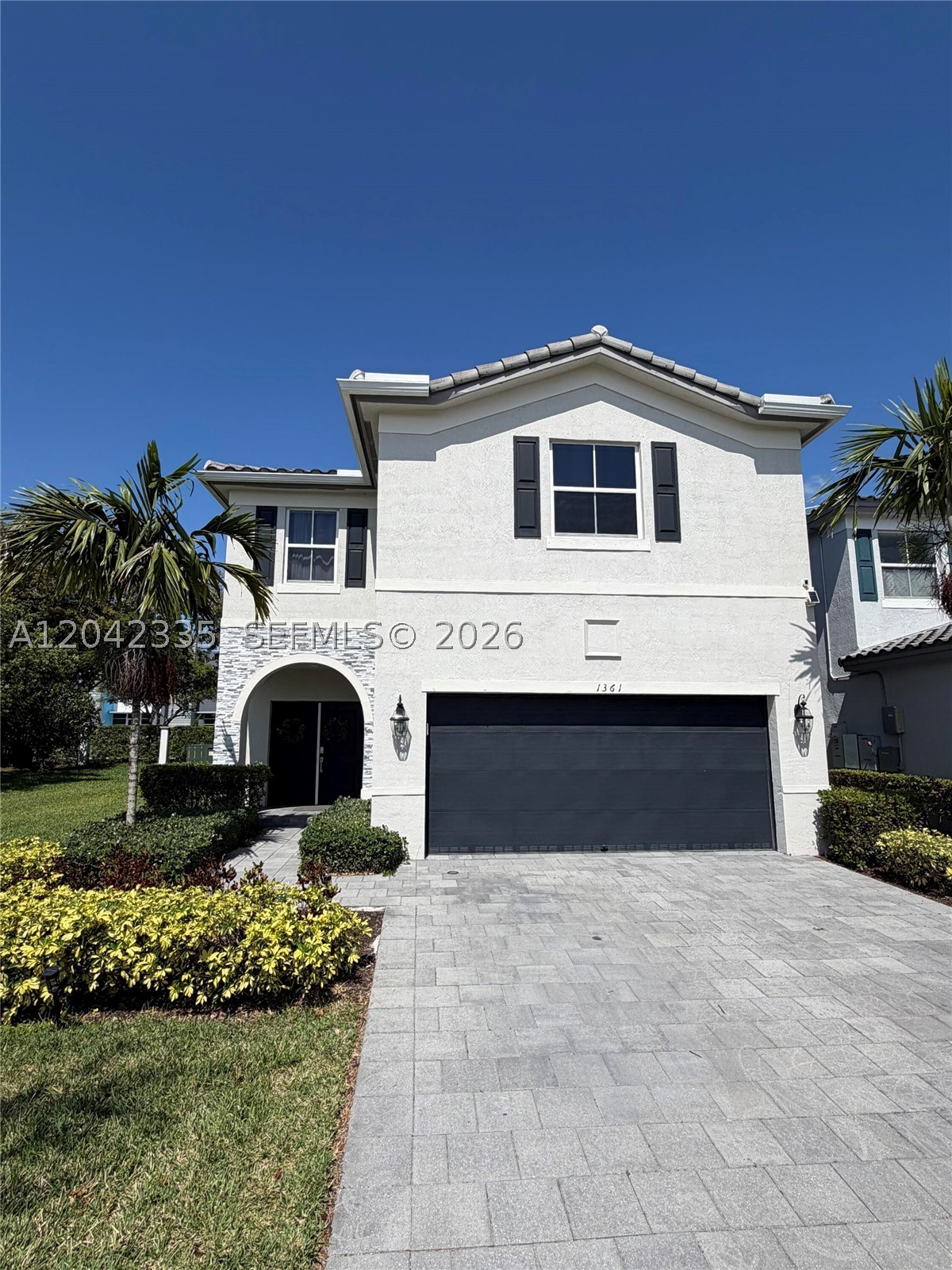 Welcome to 1361 SE 27th Terrace, Homestead, FL 33035, a beautiful and meticulously maintained home located in a peaceful, family-friendly gated community.
The home is equipped with a premium energy system that includes 18 solar panels and 2 Tesla Powerwall batteries, helping reduce energy costs and providing backup power when needed. 
* Beautifully maintained and move-in ready
* Peaceful, quiet community
* Beautiful clubhouse and community amenities, pool, gym
* Low HOA fees
* Adjacent community garden/green space offering added privacy and open views
* A unique feature of this property is its location next to a beautifully landscaped community green space/garden.
