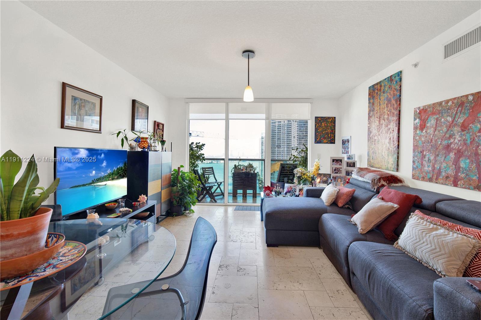 Stunning 2-Bed, 2-Bath Condo with a River view, 2 balconies in the best location in Brickell #2910; one extra parking space available for purchase .Live in luxury at Brickell on the River with this exceptional condo on the 29th floor, offering Luxurious Marble & SS Appliances. The Luxury building is located in front of the Miami River with direct access to a walkway along the river and next to a Metromover station that will take you around Brickell and Downtown and connects to Metrorail . Only one block from Brickell City Center providing a wide array of options for shopping. dining and entertainment just around the corner!. This bright and spacious unit features a modern open-concept design, high-end finishes, and a private balcony where you can take in the stunning Miami scenery