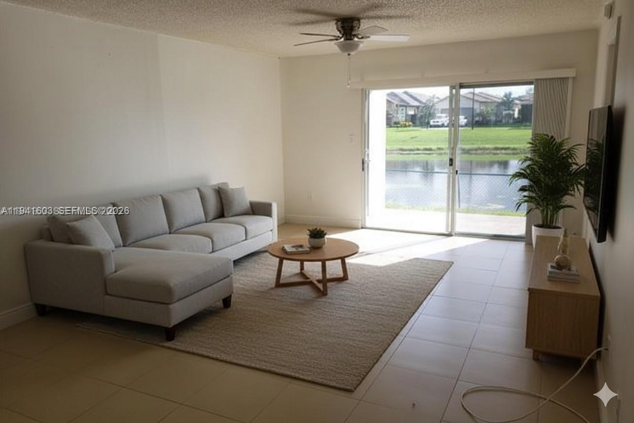 Spacious 1/1 bath unit with canal view located in a desirable gated community. This unit has been completely upgraded with granite countertops, wood cabinetry, stainless steel appliances, and tile flooring throughout. Features include a walk-in closet and in-unit washer/dryer for added convenience. Community amenities include a clubhouse, exercise rooms, and a sparkling pool. Excellent location—minutes from I-75 and the Turnpike, and directly across from Pembroke Lakes Mall. PROOF OF FUNDS AND ADVANCE SCHEDULED SHOWING REQUIRED AS TENANT OCCUPIED PAYING $1850 UNTIL 1/31/2027 (same tenant since 2020)