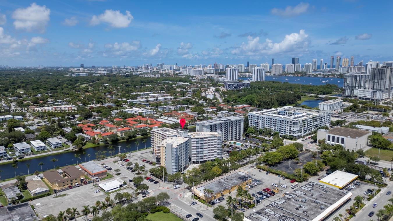 This exceptional corner apartment on the 5th floor offers a fantastic investment opportunity in North Miami Beach. With abundant natural light and stunning lake views from the balcony, the unit features two generously sized bedrooms, two full bathrooms, and a walk-in closet for storage. The building provides convenient elevator access, and the apartment's living areas are perfect for both relaxation and entertaining. This property is ideal for investors seeking a high-demand rental or a future resale in the thriving North Miami Beach area.