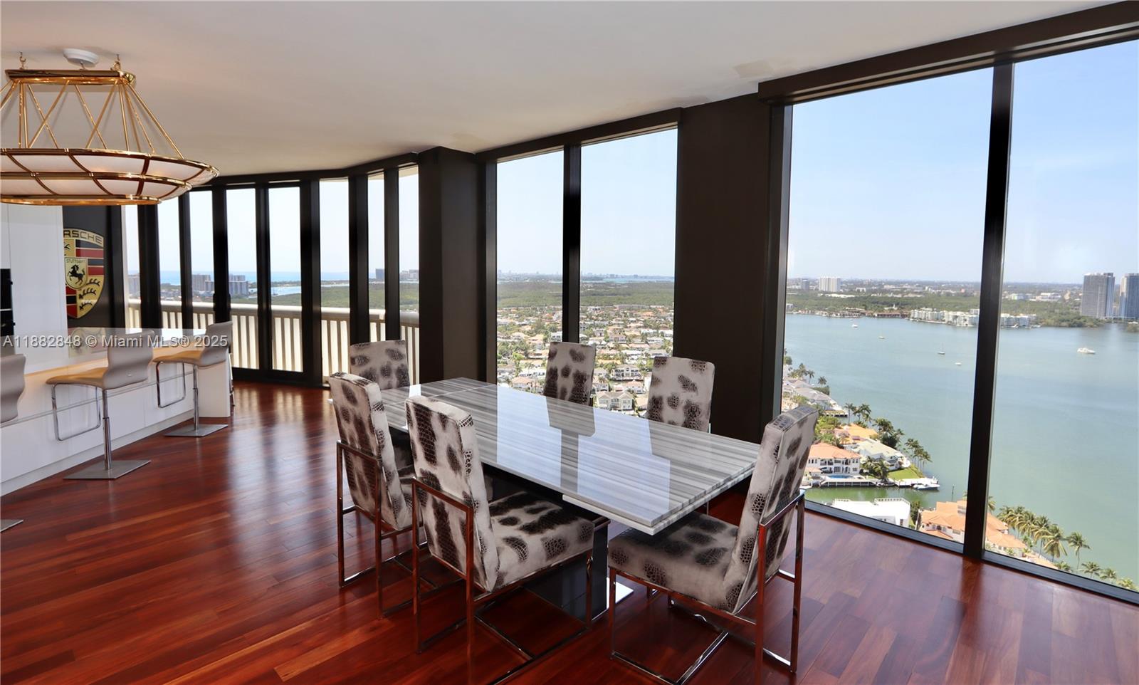 BEAUTIFUL PENTHOUSE RESIDENCE. UNOBSTRUCTED OCEAN, INTRACOASTAL & CITY VIEWS FROM EVERY ROOM . TOTALLY REMODELED ART DECO OPEN CONCEPT "CONVERTED" TO A 1 BED LOFT, 2 BATHS. GORGEOUS WOOD FLOORING. IDEAL FOR ENTERTAINING. IMPACT GLASS WINDOWS THROUGHOUT. TOP OF THE LINE MIELE APPLIANCES, SANCTUARIUM ITALIAN KITCHEN IN MATTE WHITE FINISH. BLUM SLOW MOTION & SOFT CLOSE CABINETS. QUARTZ COUNTERTOPS WITH WATERFALLS ON BOTH SIDES OF ISLAND. MUST SEE TO APPRECIATE . INCLUDES EXCLUSIVE ROOFTOP RIGHTS TO ADD A 2ND-LEVEL SUITE, BATH, & EXPANSIVE TERRACE WITH SUMMER KITCHEN & HOT TUB. LIVE AMONGST PRESTIGIOUS FULL SERVICE AMENITIES:  14 TENNIS COURTS, 4 PICKLE BALL COURTS, 2 PADEL COURTS, 3 RESTAURANTS, STATE OF THE ART SPA, MARINA, WALK/JOG PATH, KIDS PLAYGROUND, BASKETBALL COURT, SOCCER FIELD, PUTTING GREEN, COURTESY BUS, PLUS GOURMET SUNDRY COFFEE/GELATO SHOP, AND SO MUCH MORE....