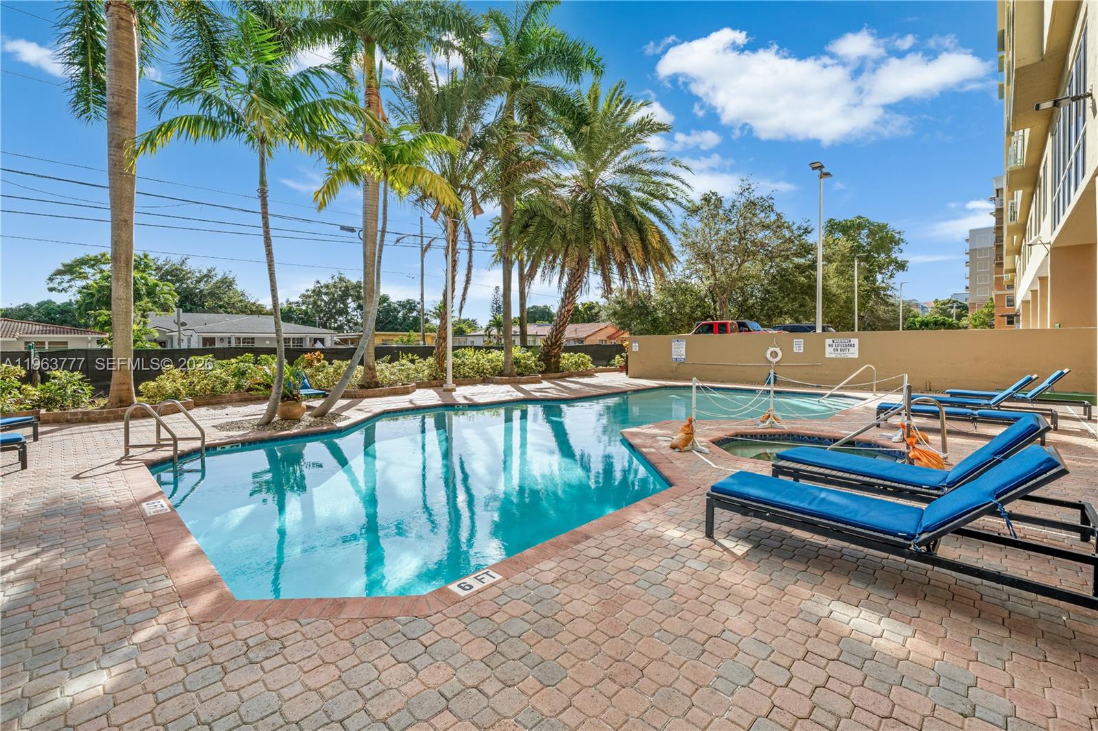 Exceptionally located and upgraded 2BR/2BA unit in sought-after Coral Plaza, perfectly positioned on Coral Way minutes away from Miracle Mile. The home, located on the 12th floor with panoramic open views of Coral Gables, Coconut Grove and Miami Skyline, showcases a modern open kitchen with quartz countertops, updated appliances (oven & dishwasher 2025, refrigerator 2024), and newer A/C (2024). Functional versatile split layout with two private ensuite bedrooms, dedicated dining area, ceramic flooring throughout, generous storage, and washer/dryer in unit. Private balcony with open city views. Includes one covered assigned parking space and guest parking is available. Coral Plaza offers pool and gym amenities. Unbeatable location near Coral Gables dining, shopping, and major commuter routes to Brickell, Downtown, and MIA.