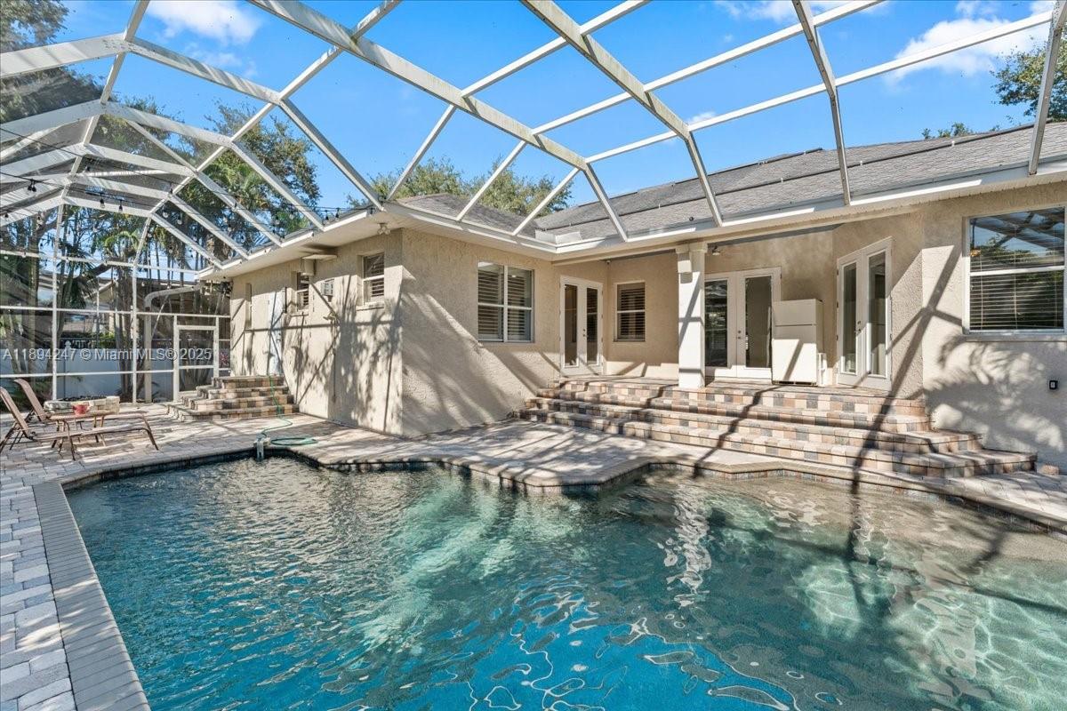 Beautiful 4-bed, 3-bath home located in the exclusive gated community of Pasadena Yacht & Country Club. This property features an open floor plan with high ceilings, wood floors, and a spacious kitchen with stainless steel appliances and breakfast bar. The master suite includes dual walk-in closets and a spa-style bathroom. Enjoy outdoor living with a heated pool, spa, and tropical landscaping. Just minutes from Gulfport beach, shops, and dining!