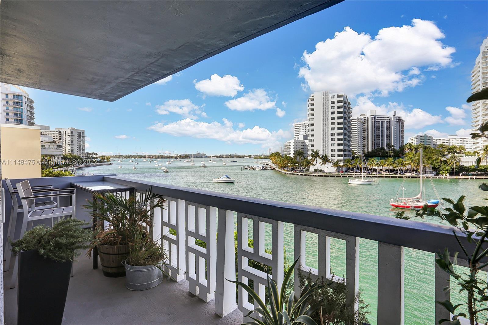 Live right on the bay, this renovated 2 bedroom, 2 bathroom condo has serene views of Biscayne Bay, oversized living room, balcony, updated kitchen and bathrooms, impact windows and doors, in-unit washer/dryer, 1 covered parking space, and a storage unit. Located just blocks from Sunset Harbour on a quite dead-end street. Building features elevator, pool and secured lobby.