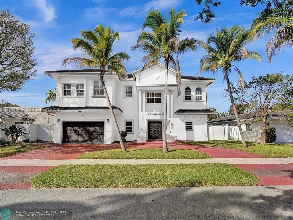 This remarkable Custom-Designed home features six bedrooms, five full baths, walk-in closets, a large pool, and an enormous second-floor Family Room. A light-filled vaulted ceiling entrance leads to a wood staircase w/ an impressive chandelier. 1st level features marble throughout, three bedrooms & 3 full baths. A state-of-the-art kitchen with 42-inch wood cabinets, Blue Granite countertops & stainless-steel appliances. This home is equipped with/hurricane-impacted windows & doors, 3 AC units & much more!