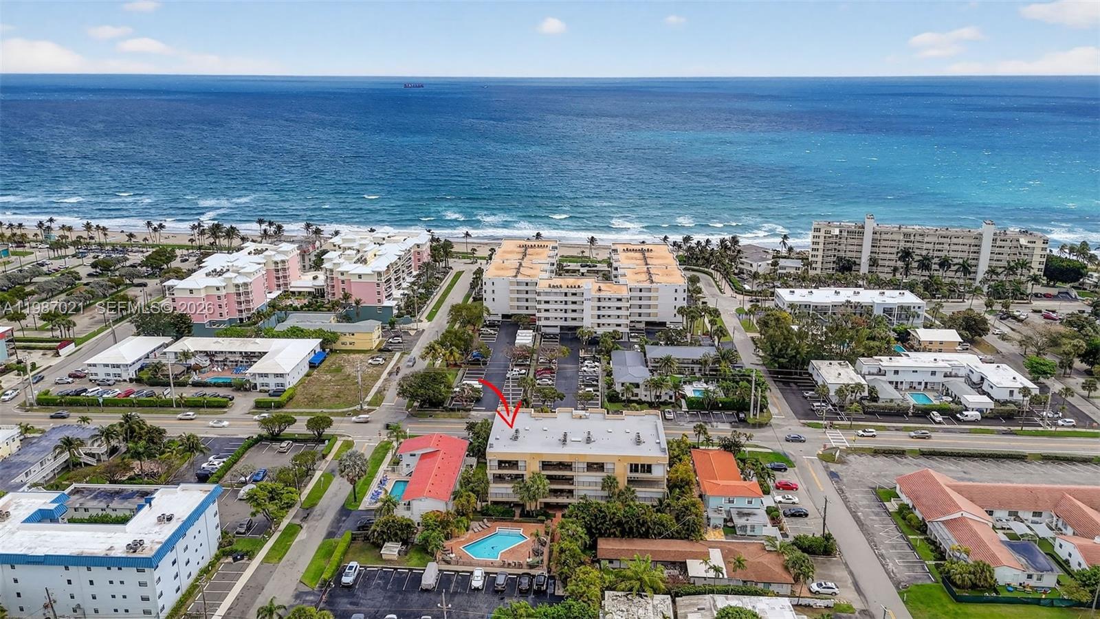 100% Turn Key Furnished! Ultra rare ground floor Villa at the Beach House, Deerfield Beach. The Beach House is a small Boutique Building of only 14 Residences. This villa is one of two units on the ground floor, with direct access to the brand new heated community pool, just redone this year, right out of your expansive rear porch.  Almost like the pool was built for this villa! The home has a private entrance as well and opens to a beautiful foyer.  Inside everything has been updated. 40 LED high hats provide excellent, modern lighting. Open Floor plan kitchen, living room & dining.  Kitchen and Baths both done with high end quartzite and waterfall edges. Washer and Dryer inside, plus a community commercial washer and dryer that residents can use free of charge on the 1st floor. Appliances are only 4 years old. A/C is 3 years. The primary room features a ensuite bath, large walk in closet and a additional exterior outdoor patio! Custom office nook built into 2nd bedroom with doors that open to living room or lock for privacy. 2 Assigned Parking Spaces! 2 exterior storage units (one climate controlled). Impact Windows and Doors. Building is in superb condition. The 40yr is completed and all assessments are paid. Sirs is fully funded. Roof redone 2025. Budget is perfect and the HOA fees are only $600/Mth! Walking distance (1 block) to the ocean and deerfield beach plus all the restaurants and activities they offer. HOA includes pool, landscape & ext maintenance.