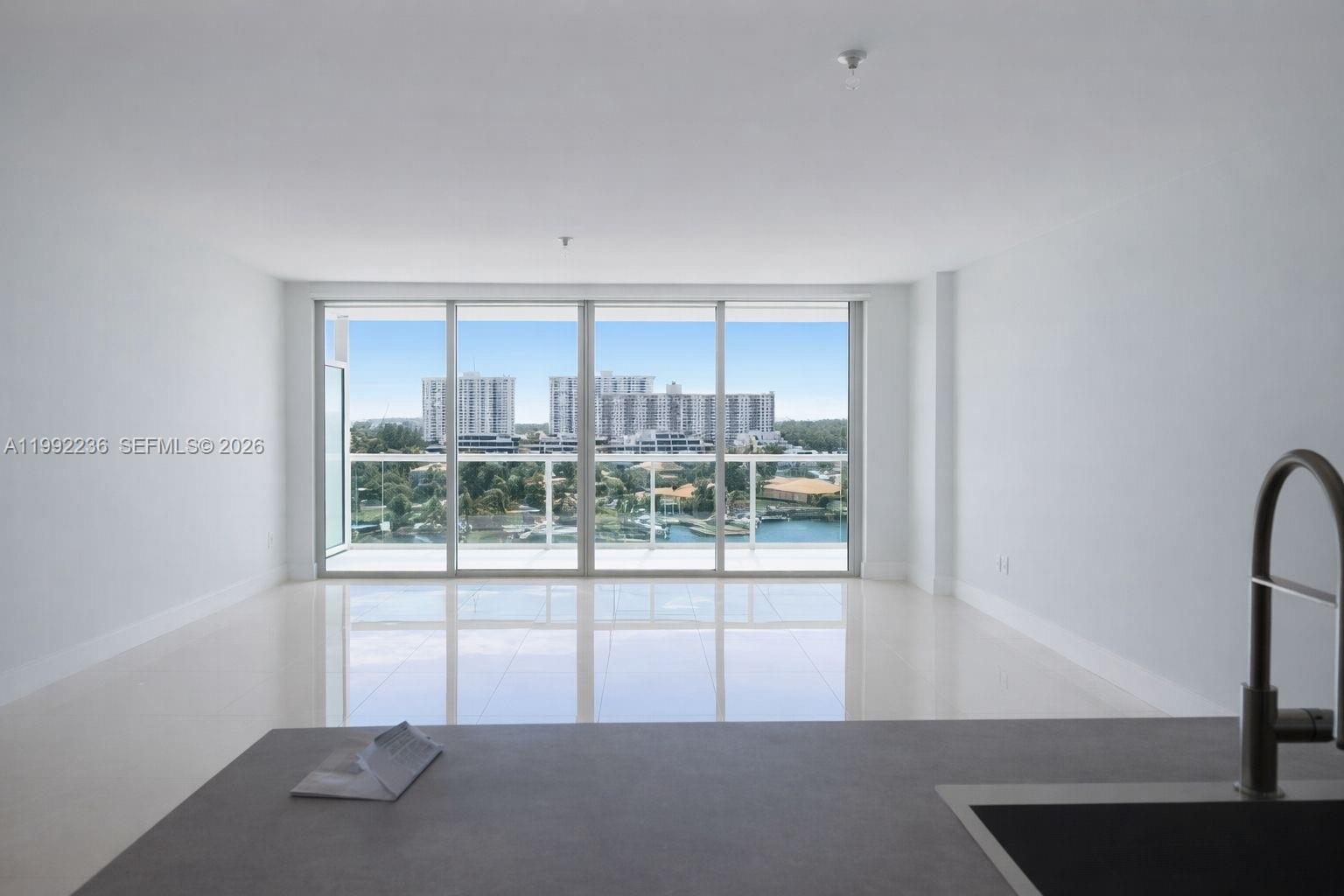 Spectacular, unobstructed water views from this stunning 3-bedroom, 3-bath residence at 400 Sunny Isles. Enjoy wide-angled views overlooking Oleta River State Park from a spacious private balcony. The unit features an upgraded kitchen with Italian cabinetry and stainless steel appliances, along with shades and blackout treatments throughout and custom California closets.

This well-maintained building offers a full-service lifestyle with resort-style amenities including a tennis court, infinity-edge pool, spa, expansive garden-style grounds, private marina, bayfront beach area, and water sports activities.
Prime location close to everything. The unit includes two assigned parking spaces.