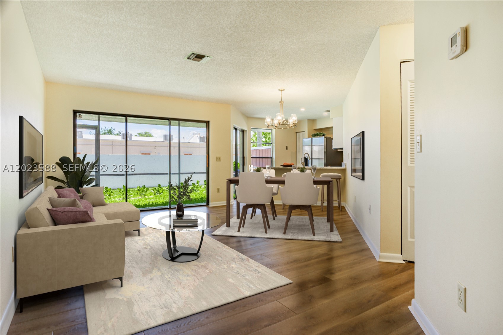 This fully upgraded, move-in-ready home offers the perfect combination of modern style, major big-ticket updates, and low-maintenance living! Featuring a NEWER 2019 roof, 2019 A/C, updated electrical panel up to code, and LOW HOA fees with the assessment already PAID IN FULL, this property delivers true peace of mind from day one. Step inside to a bright, freshly painted interior with stunning new waterproof vinyl flooring throughout and upgraded lighting that gives the home a clean, contemporary feel. The show-stopping kitchen has been completely renovated with gorgeous granite countertops and a brand-new stainless steel appliance package including refrigerator, electric range, microwave, and dishwasher. A brand-new washer and dryer are also included! Outdoor spaces have been thoughtfully refreshed with new landscaping, a newly screened porch perfect for relaxing year-round, a new front door, and a convenient exterior storage shed. Additional upgrades include professionally cleaned A/C ducts for added comfort and efficiency. Ideally located less than one mile from Villages of Hillsboro Park with tennis courts, basketball courts, playgrounds, and more. Residents enjoy resort-style, low-maintenance living with a community pool, beautifully maintained common areas, and exterior maintenance included. This is the turnkey home buyers have been waiting for!