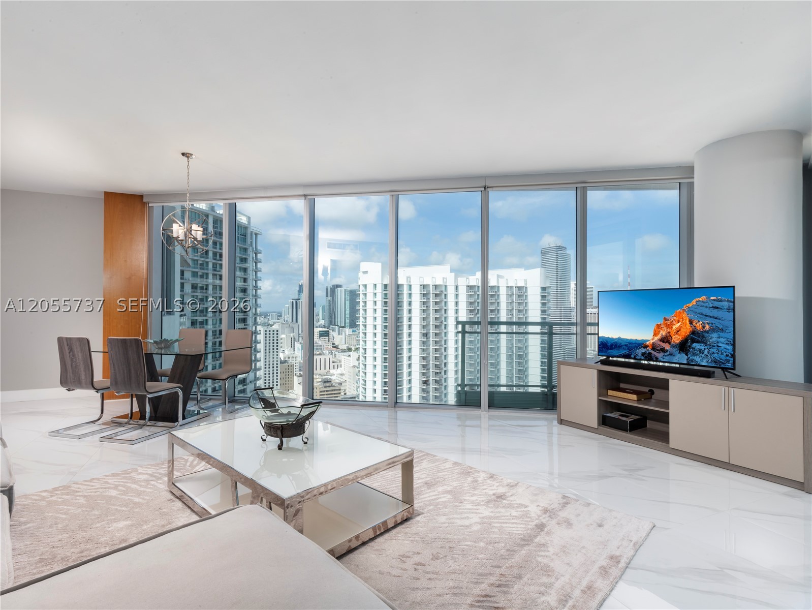 Experience downtown living in this rarely available corner residence at Mint Condominiums on the coveted Miami River. This exceptional 3-bedroom, 3-bath home spans 1,544 SF and captures divine skyline views through expansive floor to ceiling windows that fill the space with natural light. The well-designed layout offers a refined flow ideal for both entertaining and comfortable everyday living. This residence delivers the perfect balance of sophistication, privacy, and vibrant urban convenience of world-class dining, luxury shopping, entertainment, and major transit access with a premier location by Brickell.  Mint offers a modern gym facility with a spa wellness area.  Convenient covered parking space.  A rare opportunity to own a distinguished Miami address in one of the city’s most desirable settings.