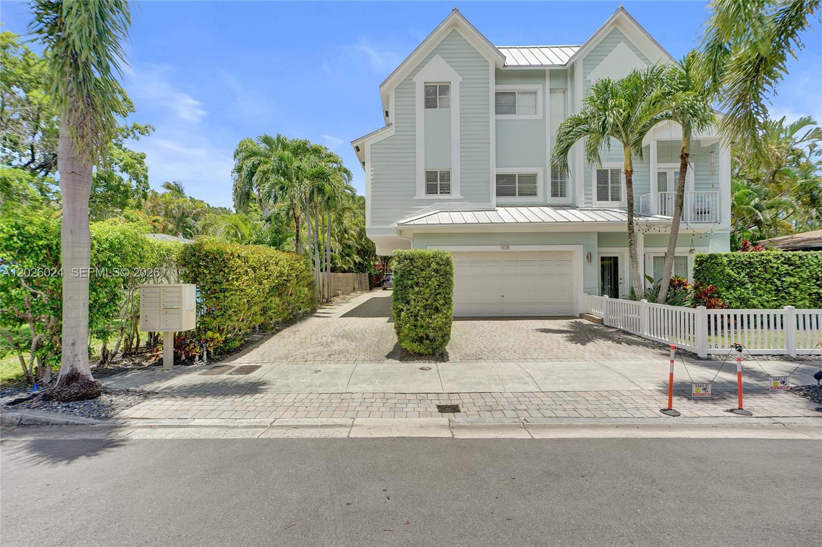 NO HOA fees and ultra-modern upgrades define this exceptional residence — the largest home in an exclusive 3-unit community with more than 2,800 square feet under air. This spacious 3-bedroom, 3.5-bath end-unit offers enhanced privacy, a private garage, and close proximity to shops, restaurants, salons, grocery stores, and more.

Designed with upscale finishes throughout, the home features oversized marble-look ceramic tile flooring, Brazilian hardwood stairs, tray ceilings, abundant natural light, and built-in surround sound. The updated kitchen showcases stainless steel appliances and sleek modern cabinetry. Additional highlights include two private balconies, impact windows, a whole-house water softener, and a new third-floor HVAC system, completing this move-in-ready luxury home.