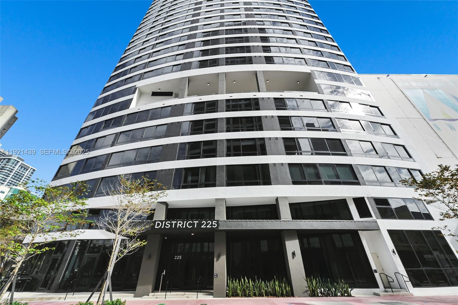 ***Seller offering prepaid condo dues with an acceptable offer.*** Experience elevated urban living at District 225, a brand-new full-service luxury condominium in the heart of Miami. Designed for effortless Airbnb hosting, owners may list their residences with the guidance of an on-site concierge. This fully furnished residence features 9-foot ceilings, contemporary lighting, and smart-home technology for seamless control. The gourmet kitchen offers custom Italian cabinetry and premium Bosche appliances, including a paneled refrigerator and dishwasher, built-in convection oven, and cooktop. Additional features include built-out closets, a full-size washer and dryer, spa-inspired bathrooms with rain showers and Italian vanities, and high-speed data pre-wiring ideal for remote work. Amenities deliver a true resort-style lifestyle with an expansive pool deck, bar, social lounges, and entertainment spaces. Wellness amenities include a state-of-the-art fitness center, yoga and spinning studios, indoor basketball court, rock-climbing wall, racquetball court, and full-service spa. Additional offerings include a dedicated co-working floor with private meeting rooms, conference space, and lounge areas. The rooftop amenity deck features a plunge swim spa, fire pit, summer kitchen, and stunning views of Downtown Miami and Biscayne Bay. District 225 offers a refined, connected lifestyle where luxury living, modern convenience, and short-term rental flexibility come together seamlessly.