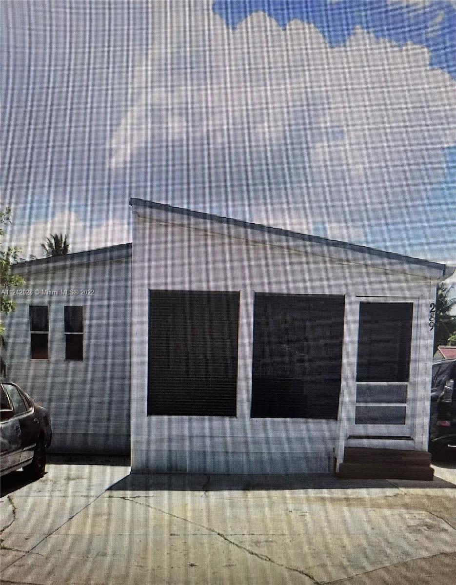Opportunity 3 Bedrooms 2 Bathrooms, No Land Lease. Only Trailer Community Where you Own the Land. Lot # 289

Mobile/Manufactured Home with LAND included in much sought after "Americana Village Estates". Some features include screened front porch, front slab parking plus parking on side (slab) for boat or other, guard gate, tennis courts, playground, community pool, guard at entrance, and more with low monthly maintenance fee.