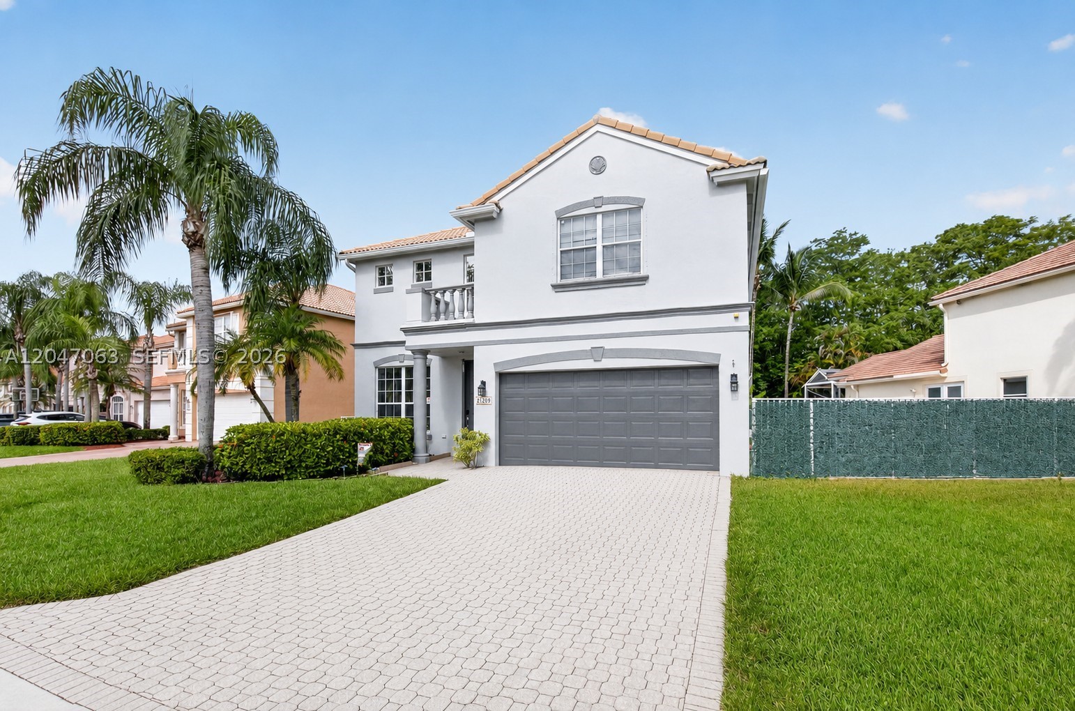 Welcome to 21209 Via Ventura in the 24 hr Guard Gated Community of Mizner Pointe in Central Boca & this popular 4 bed + Loft, 3.5 bath 2 story model on the preserve.  The 1st floor features Primary Owner's Suite, Open Kitchen to Family room, Dining & Living Rooms w/ tall ceilings, 1/2 bath for guests.  2nd floor has spacious 3 full bedrooms + 2 full baths and a loft area.  Ideal for large families, or owners that love to entertain.  New AC 2023, Covered Area, Not in a flood zone.  The location is superb in the Del Prado Elementary, Omni Middle, Olympic Heights High Schools, close to all shops, dining, Town Center mall, I-95, Turnpike.  Low Hoa only $395 per month includes State of the Art Fitness Center, Tennis court, playground, community pool, lawn, cable, internet.