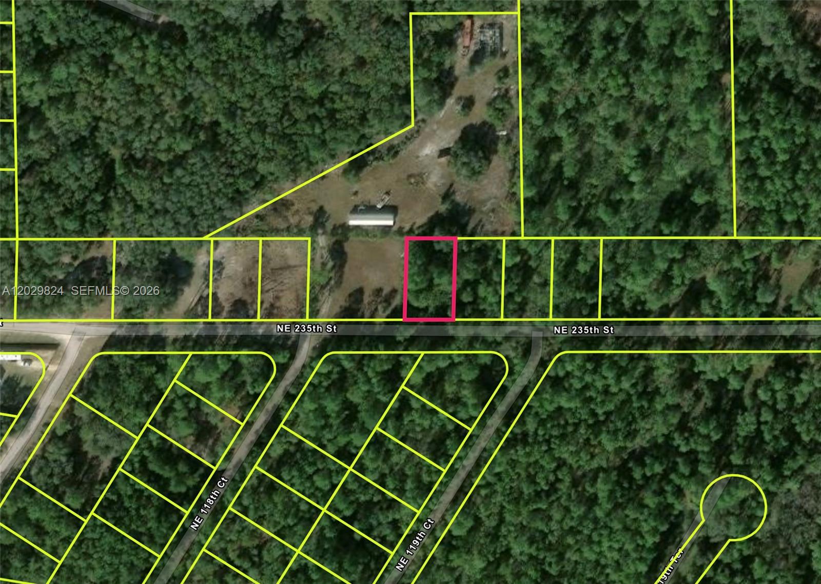 Discover your next project with this affordable 0.22-acre building lot in Fort McCoy. Zoned R-4, this property offers incredible versatility by welcoming site-built, modular, and mobile homes. The lot features a perfect 75' x 125' rectangular building envelope and benefits from direct access via a paved road on NE 235th Street. Situated in FEMA-confirmed Flood Zone X, the property offers a clean and accessible build site. Nature lovers will appreciate the location, which is just 15 minutes from the Ocala National Forest and offers easy access to outdoor recreation. With low annual taxes of only $86, this is a highly accessible entry-tier investment opportunity. The property is being sold as-is with a straightforward 14–21 day closing timeline. Buyer is responsible for independent verification of all zoning, utility, and building requirements with Marion County. Secure this versatile land opportunity today!