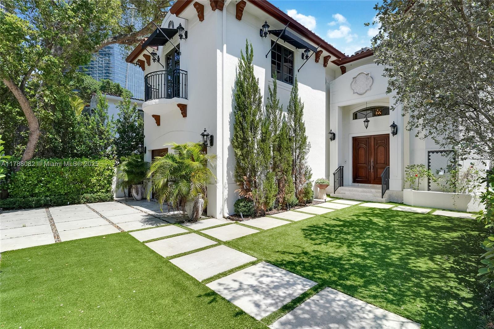 Exceptional single family home just a short walk to the heart of Brickell. This beautifully renovated residence is located on historic South Miami Avenue directly across the street from Simpson Park. With over 5,500 square feet of interior living space this 5 bedroom 5 1/2 bath home is perfectly suited for both family living and entertaining.
The updated open kitchen features a Sub Zero refrigerator freezer and wine cooler, Bosch dishwasher, and new cabinets. Expansive backyard entertaining area has a salt water swimming pool, summer kitchen with BBQ, and putting green. High tech security system includes cameras throughout the property.
Maid quarters with adjacent spacious laundry room and two car garage complete this majestic property.