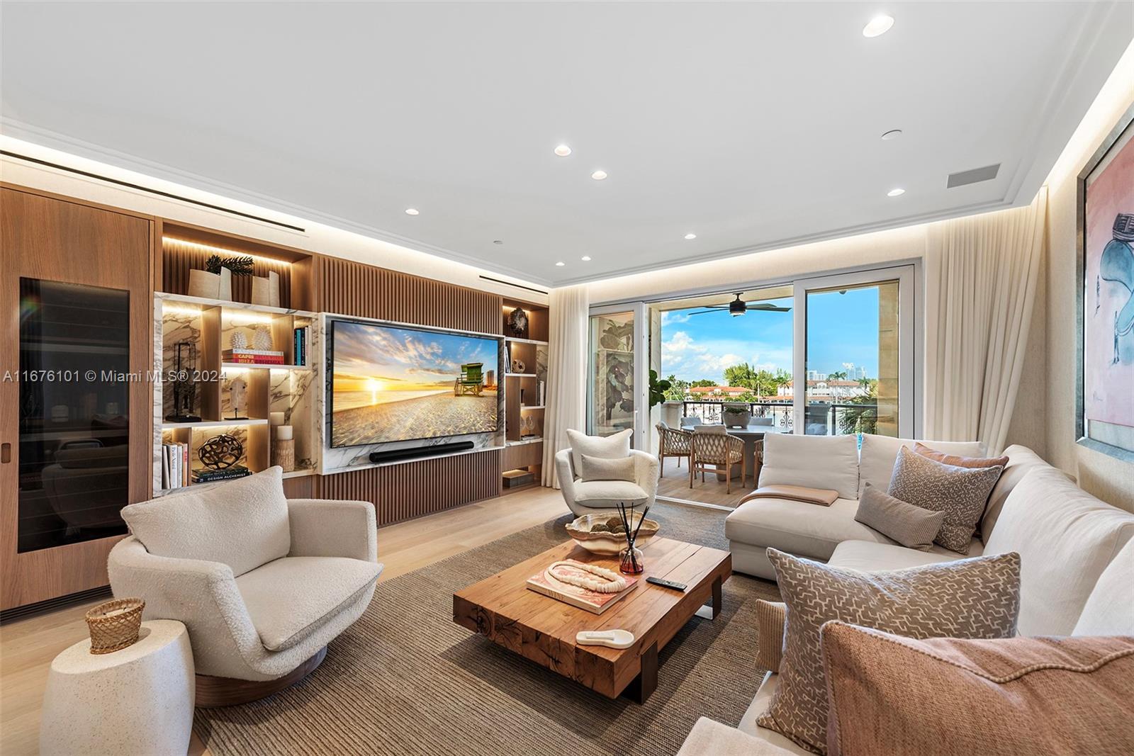 Visit this exquisite 3 bed, 2.5 bath Bayside Village condo on Fisher Island. Spanning 1,847 sq ft of impeccably designed by Ford Interiors, this flow-through unit has been completely renovated with the finest  craftsmanship and high-quality finishes, offering a luxurious living experience. Step into the spacious extended terrace overlooking the Fisher Island Marina, golf course and Miami Beach. The gourmet kitchen is a chef’s dream, featuring top-of-the-line appliances. The residence is fully furnished, professionally designed & decorated. Boasting elegant oak wood floors, Lutron lighting, custom leather and wood built-ins, impact glass doors, Italian doors, seamless indoor-outdoor living and many more features. This home is the epitome of elegance and sophistication!