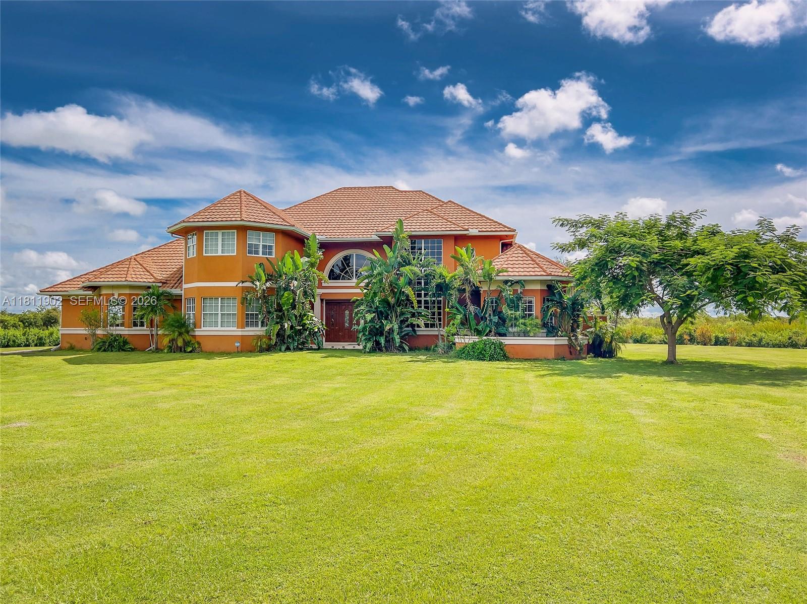 Luxury waterfront multi-family estate offering breathtaking, unspoiled views where every detail was intentional. This extraordinary private compound features a custom-built 7,181 sq. ft. main residence with 4 en-suites, pool bath, & half bath along with a separate 3/3 guest house with a 6-car garage. Situated on private acreage with its own gated driveway, private boat ramp, & dock. Built to withstand CAT 5 hurricanes, CBS construction, metal roof, high elevation, no flood insurance required. The luxurious dual primary suites include custom closets, separate his-and-her vanities, rain showers, and Jacuzzis. Interior finishes include travertine, marble, onyx, and wood flooring throughout. The gourmet chef’s kitchen is appointed with Brookwood cabinetry, “jeweled” granite countertops, double sinks, double ovens, bread warmer, gas cooktop island, breakfast nook, wine room, oversized walk-in pantry, and an expansive great room with a custom bar designed for entertaining. Additional features include plantation shutters, wraparound waterfront verandas, private upstairs balconies, elevator shaft, Icynene insulation for energy efficiency whole-house security system. Surrounded by pristine Florida ecosystem and abundant birdlife, the property offers miles of interconnected waterways leading to the Peace River and Charlotte Harbor. Underground utilities allow for helicopter or seaplane landing and storage. Located across from F-13 Airport & only 10 miles from Punta Gorda Airport.