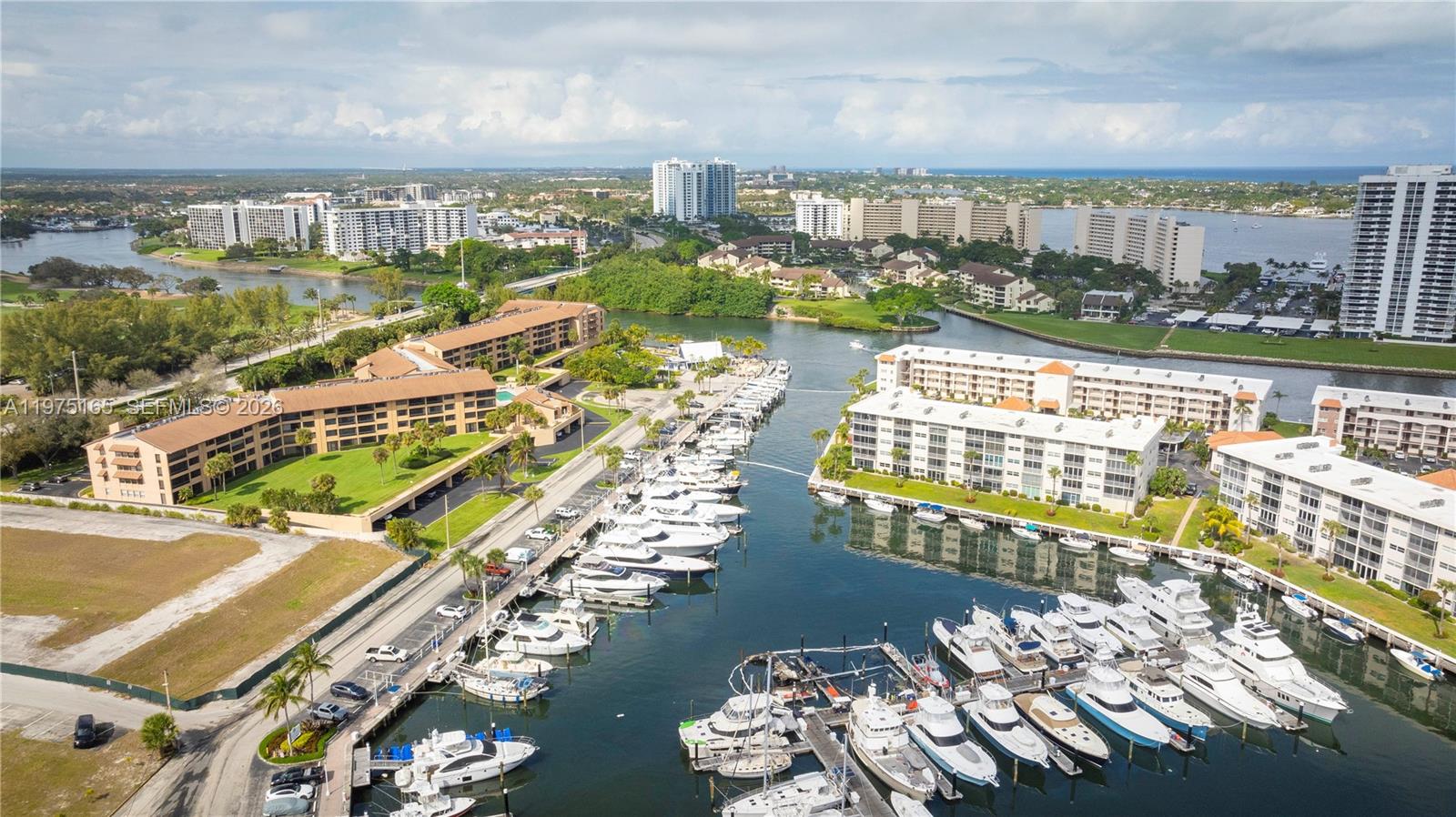 Discover coastal living at its finest in this beautifully renovated condo, perfectly situated near the Intracoastal Waterway and Safe Harbor Marina. This immaculately updated residence boasts marina and water views, creating a serene and picturesque backdrop for your daily life. Step inside to find a bright, airy interior, fresh paint, and elegant flooring. Nestled in a well-maintained, secure community, this condo offers easy access to the Intracoastal, pristine beaches, waterfront dining, and boating opportunities. Whether you seek a full-time residence or a vacation getaway, this move-in-ready home provides the perfect blend of luxury, comfort, and convenience.