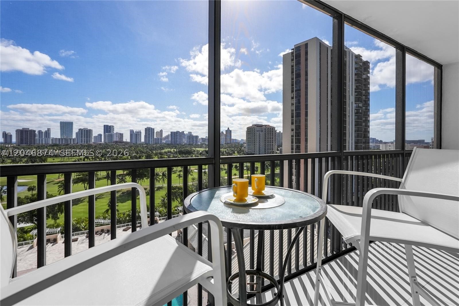 The most desirable and largest 2 bed 2 bath in the building, beautiful views from the balcony and all bedrooms and the living room. Recently renovated bathroom with a modern glass-enclosed shower, tile floors and a split-style floor plan allow natural light throughout the unit, Walk In Closet. Spacious balcony with amazing golf course views and city skyline views. Includes 1 assigned parking space in a covered garage and 1 storage unit. Just minutes to the beach, Aventura Shopping Mall, Turnberry Golf Course, Sunny Isles, US1, supermarkets, cafes and restaurants. Secured gated community with plenty of guest parking spaces. The building passed 40-year certification and features renovated halls, lobby and elevators. Amenities include fitness center, pool, sauna, jacuzzi, and 24-hour security