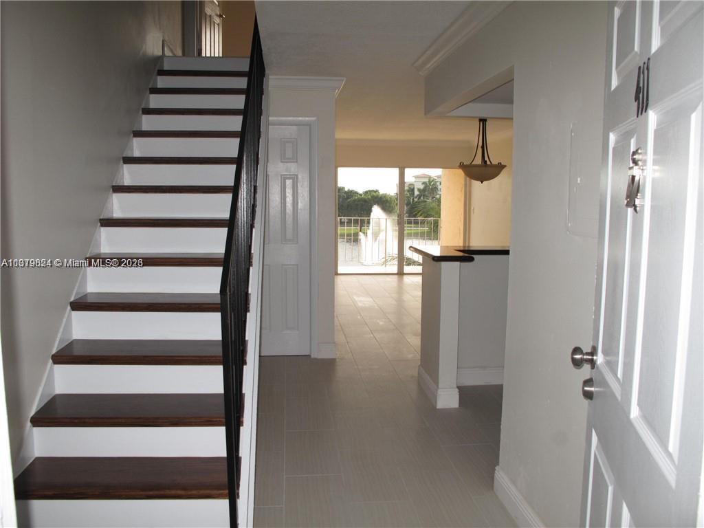 Beautiful and spacious split unit featuring two balconies with lake view! Gated community with 24/7 patrolling security. Washer/ Dryer inside, Walk-in Closet. Amenities include two pools, tennis courts and a gym. Close to FIU, shopping malls, MIA airport and expressways.
