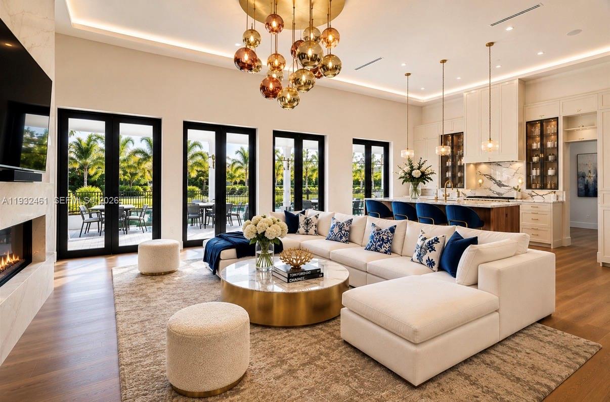 This exceptional Contemporary Modern Farmhouse is located in the heart of Pinecrest on a private dead-end street with tranquil canal views on two sides. Offering approximately 6,389 square feet, the residence showcases natural white oak flooring and a thoughtfully designed indoor-outdoor living concept. The home features five bedrooms, a dedicated office, and an expansive upper-level flex space ideal for a gym, media room, or additional living area. Includes 6.5 bathrooms and a two-car garage with lift capacity. A truly unique and private retreat.