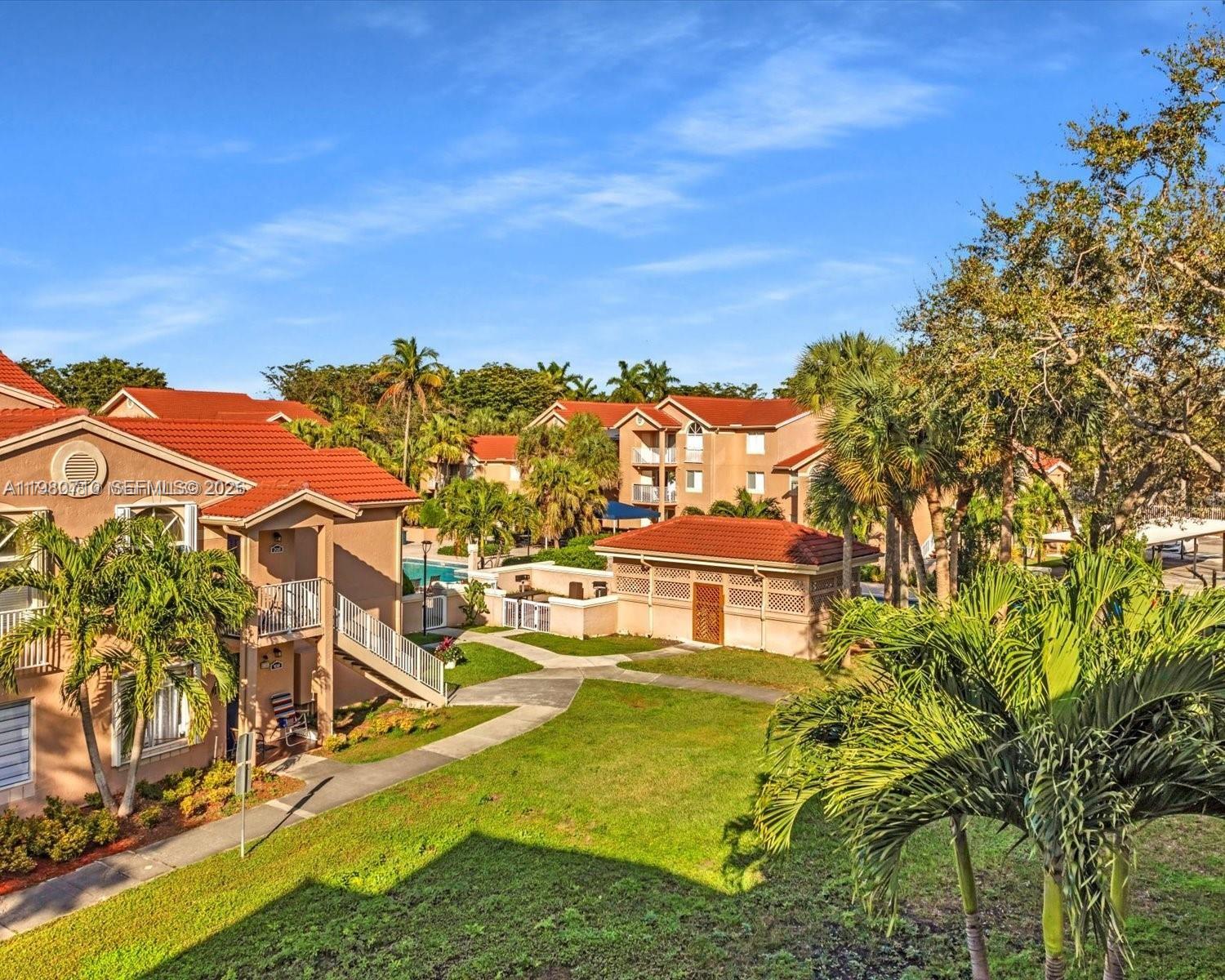 Investor Wanted! Discover this beautiful top-floor condo in Kendall. Royal Palm Place is a desired Hammocks Community. This bright and airy 2BR/2BA unit features an open layout with vaulted ceilings and plenty of natural light. The split bedroom design ensures privacy, and the unit includes tile flooring throughout, an private balcony with extra storage, and an in-unit washer and dryer. Freshly painted with no special assessments, this condo is an ideal investment—leasing is permitted immediately. The HOA covers water, sewer, and pest control. Residents enjoy community amenities like a pool, playground, and gated security. Located near parks, shopping, dining, and highly-rated schools, this is a must-see opportunity in South Florida. The owner is motivated—don’t wait!